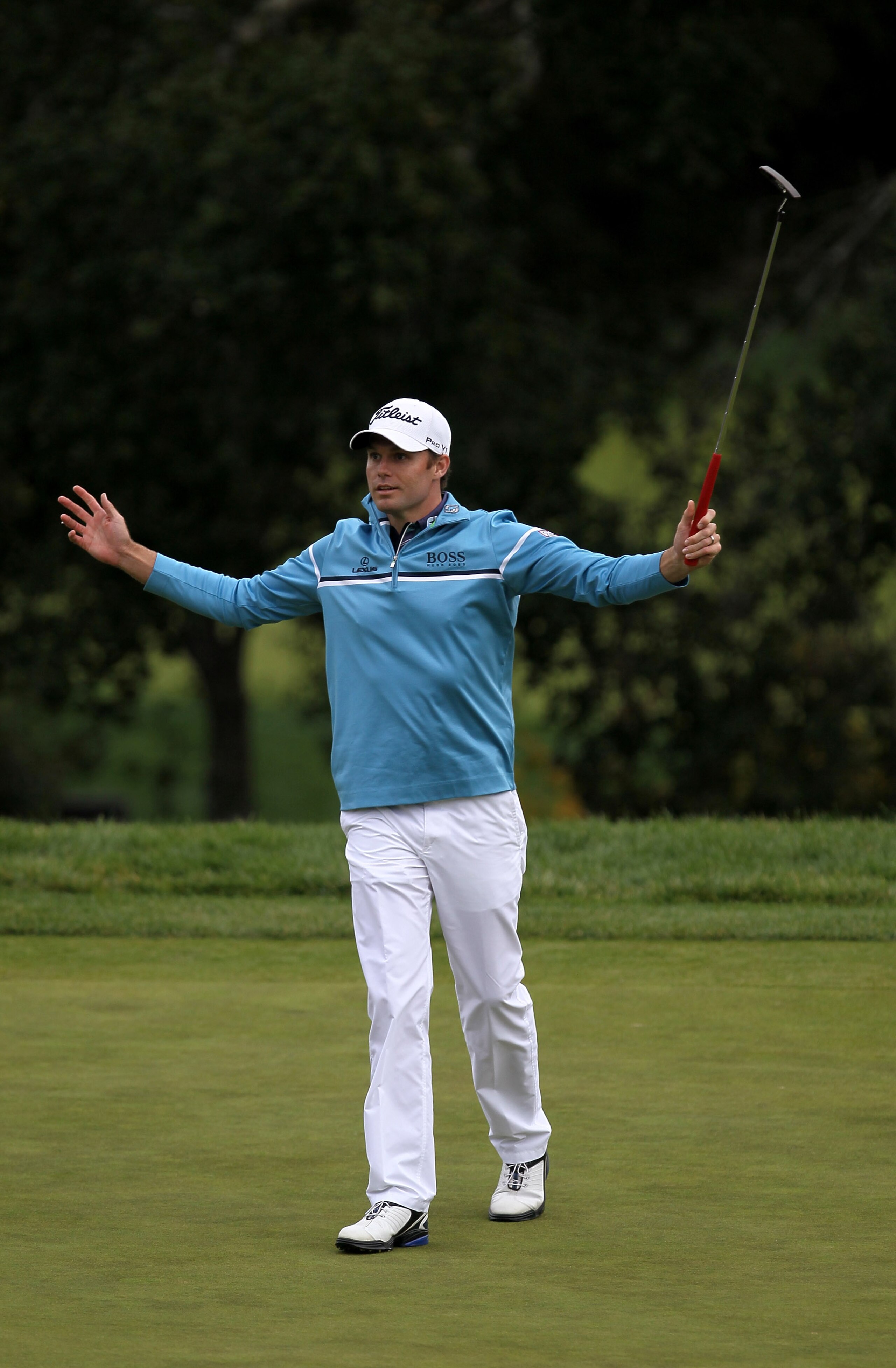THOUSAND OAKS, CA - DECEMBER 4:  Nick Watney reacts after making a long birdie putt on the 18th hole during round three of the Chevron World Challenge at Sherwood Country Club on December 4, 2010 in Thousand Oaks, California.  (Stephen Dunn/Getty Images)