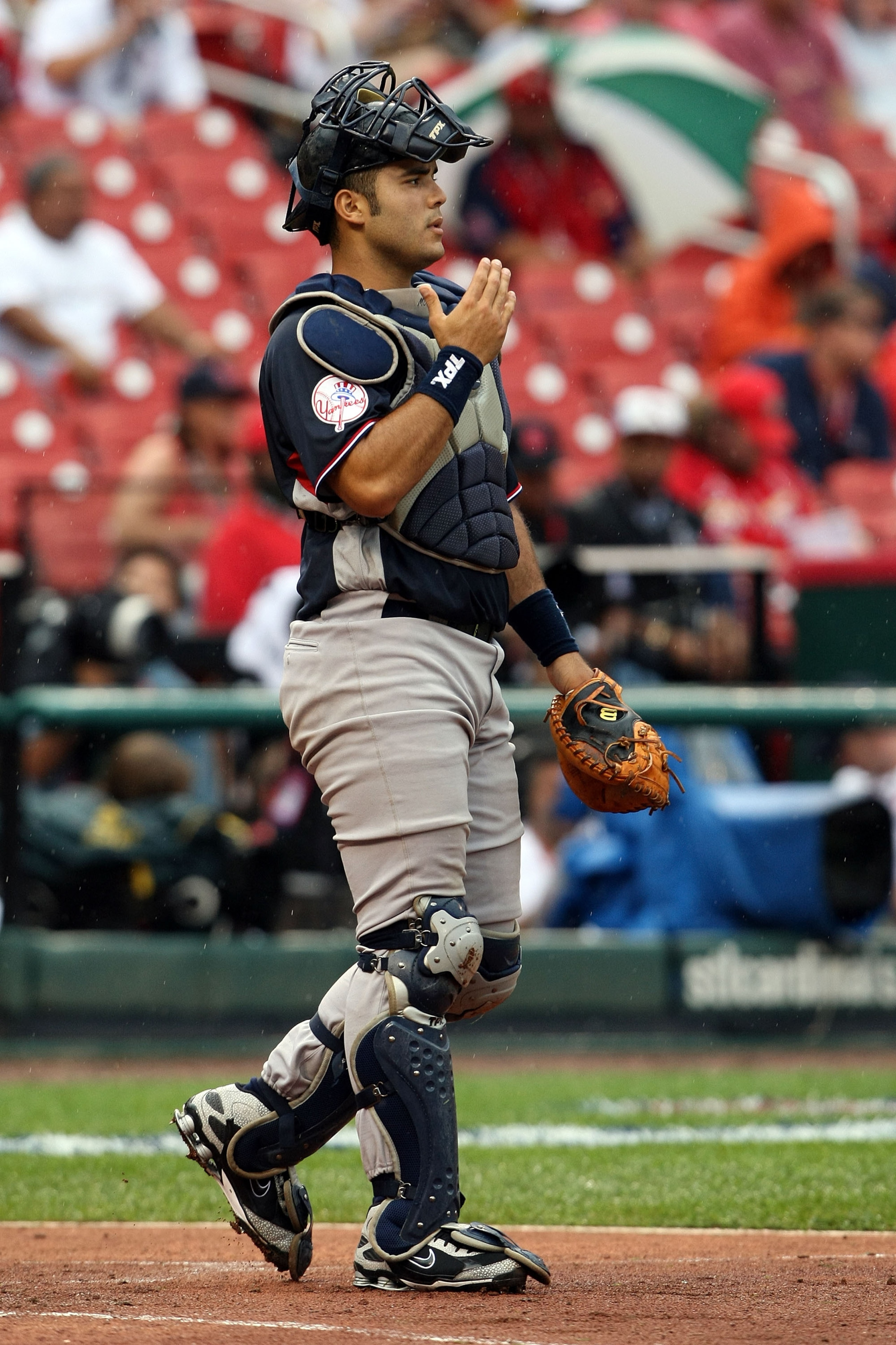 ST LOUIS, MO - JULY 12:  World Futures All-Star Jesus Montero of the New York Yankees walks out to the mound during the 2009 XM All-Star Futures Game at Busch Stadium on July 12, 2009 the in St. Louis, Missouri.  (Photo by Elsa/Getty Images)