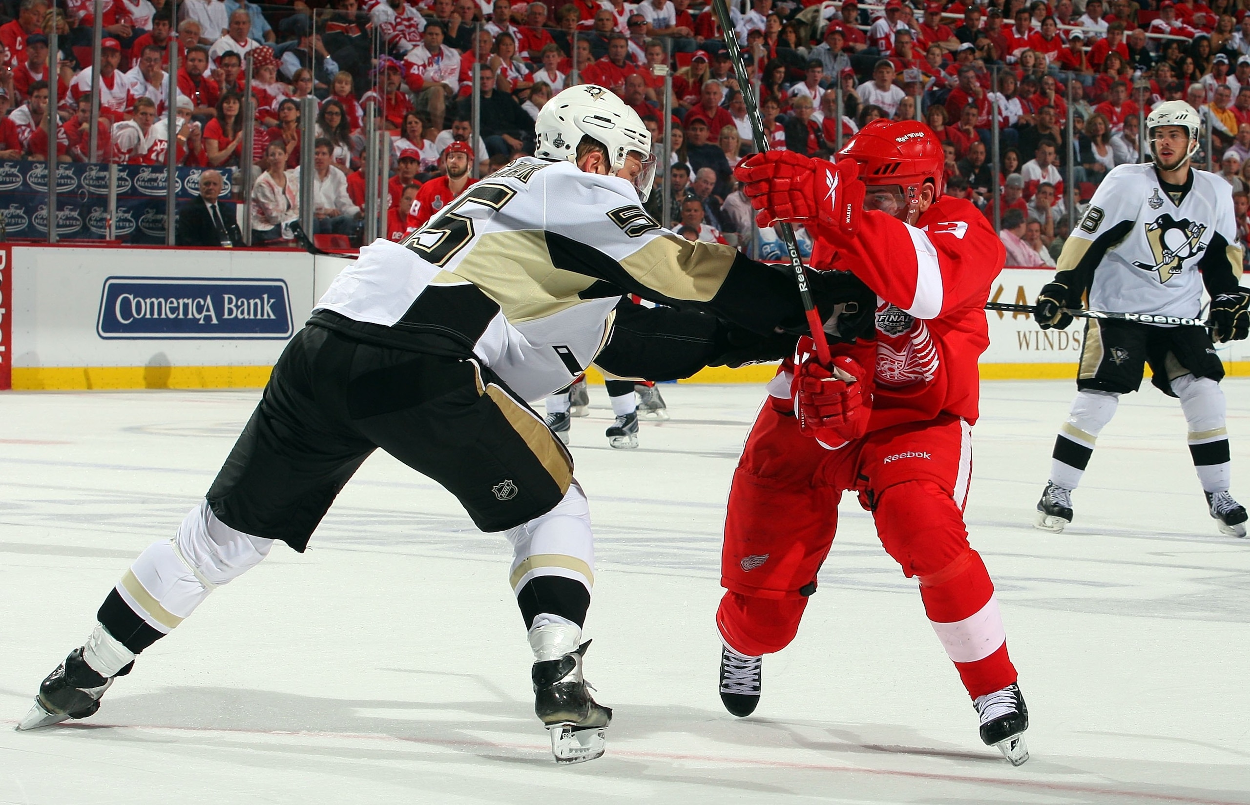 DETROIT - JUNE 12:  Sergei Gonchar #55 of the Pittsburgh Penguins defends against Pavel Datsyuk #13 of the Detroit Red Wings during Game Seven of the 2009 NHL Stanley Cup Finals at Joe Louis Arena on June 12, 2009 in Detroit, Michigan.  (Photo by Jim McIs