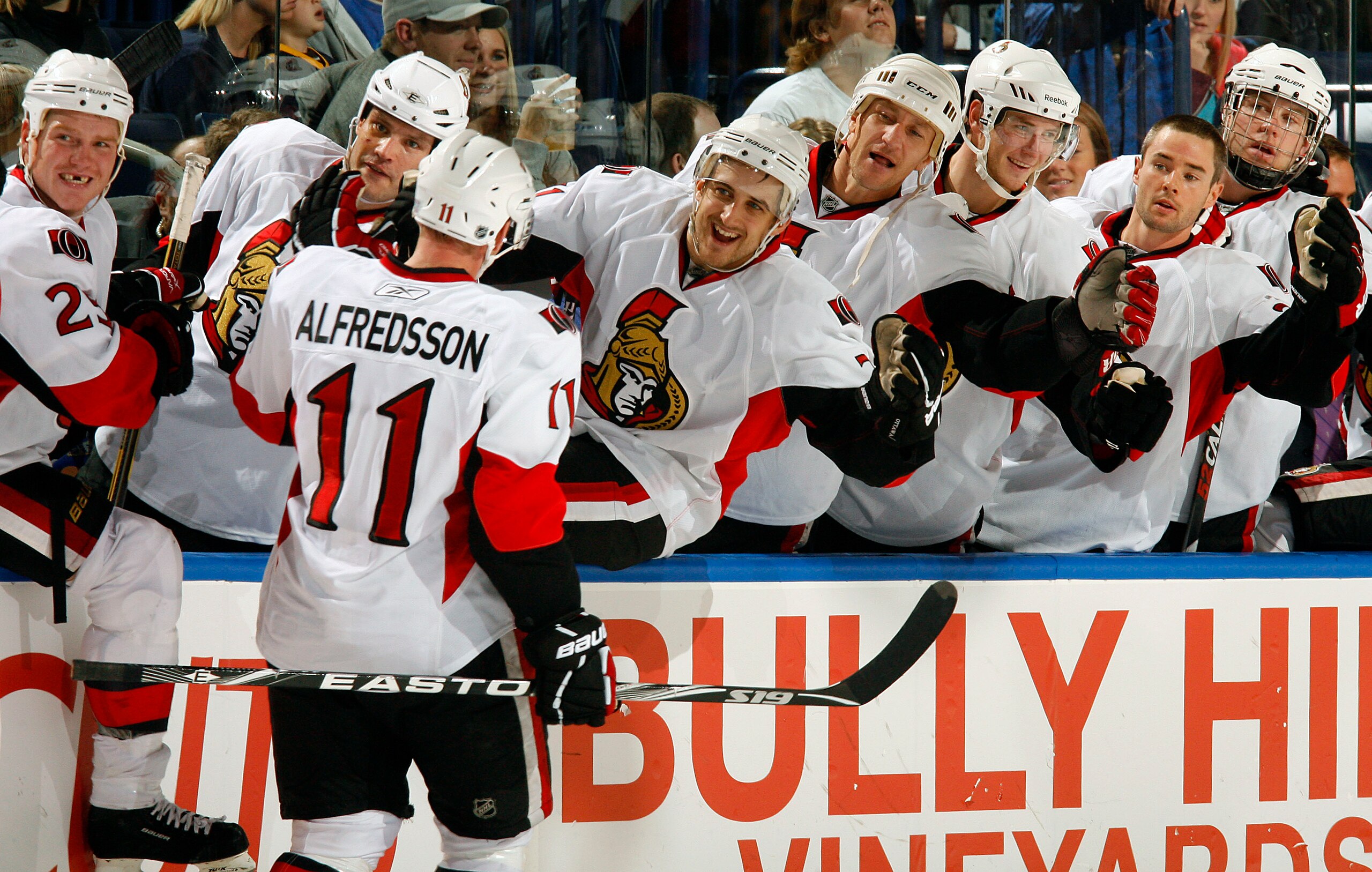 BUFFALO, NY - OCTOBER 22:  Daniel Alfredsson #11 of the Ottawa Senators celebrates his 1000th NHL point on a an empty net goal against the Buffalo Sabres  during their NHL game at HSBC Arena October 22, 2010 in Buffalo, New York.  (Photo By Dave Sandford/