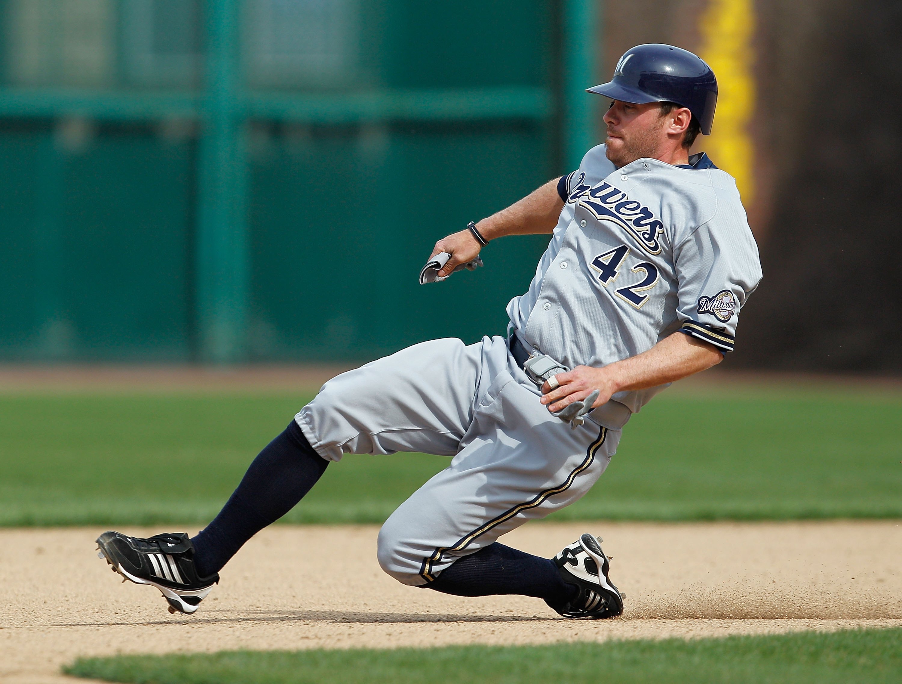 CHICAGO - APRIL 15: Joe Inglett of the Milwaukee Brewers, wearing a number 42 jersey in honor of Jackie Robinson, slides into second base against the Chicago Cubs at Wrigley Field on April 15, 2010 in Chicago, Illinois. The Brewers defeated the Cubs 8-6. 