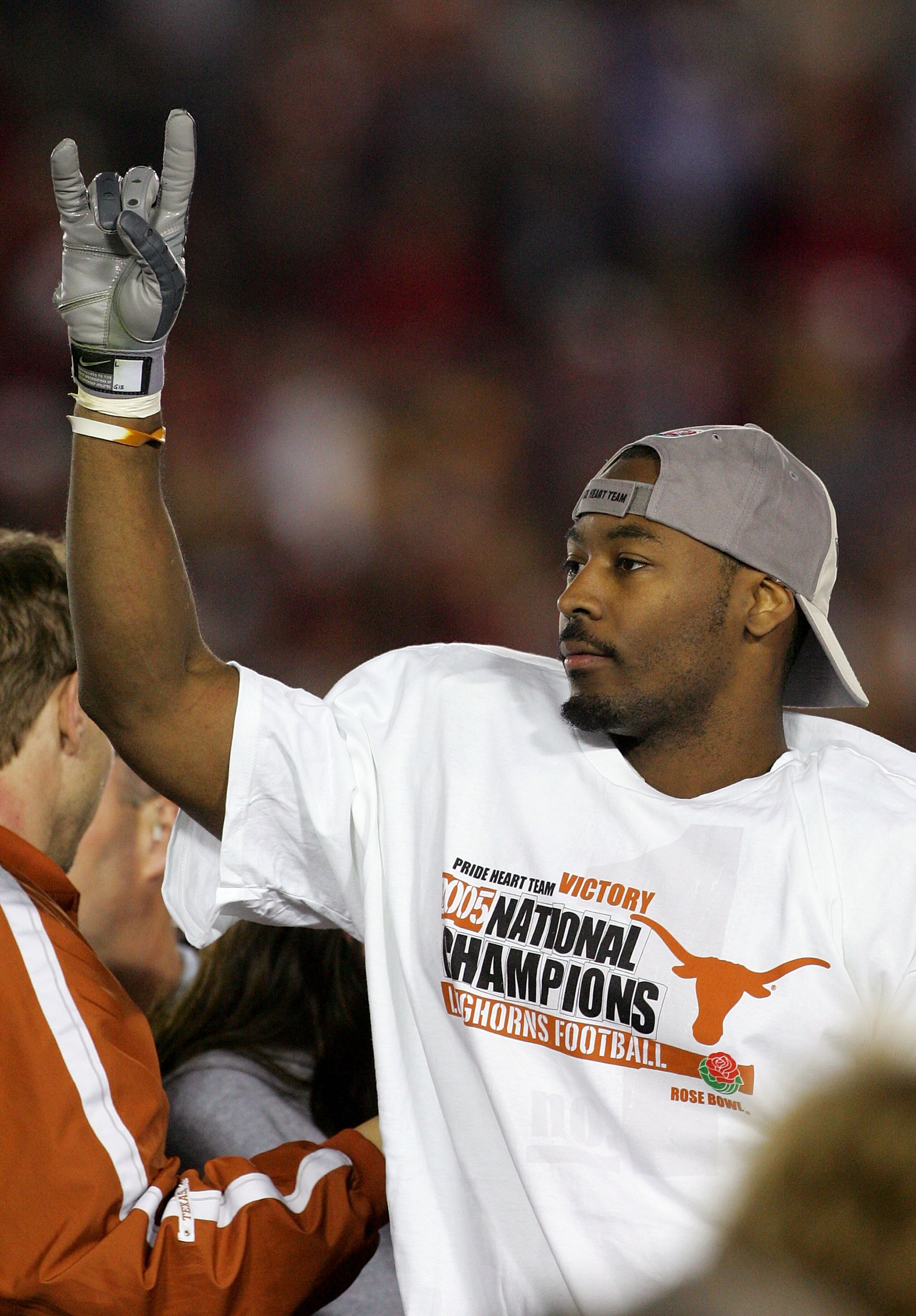 PASADENA, CA - JANUARY 04: Defensive player of the game Michael Huff #7 of the Texas Longhorns celebrates after defeating the USC Trojans in the BCS National Championship Rose Bowl Game at the Rose Bowl on January 4, 2006 in Pasadena, California. Texas d PASADENA, CA - JANUARY 04: Defensive player of the game Michael Huff #7 of the Texas Longhorns celebrates after defeating the USC Trojans in the BCS National Championship Rose Bowl Game at the Rose Bowl on January 4, 2006 in Pasadena, California. Texas d