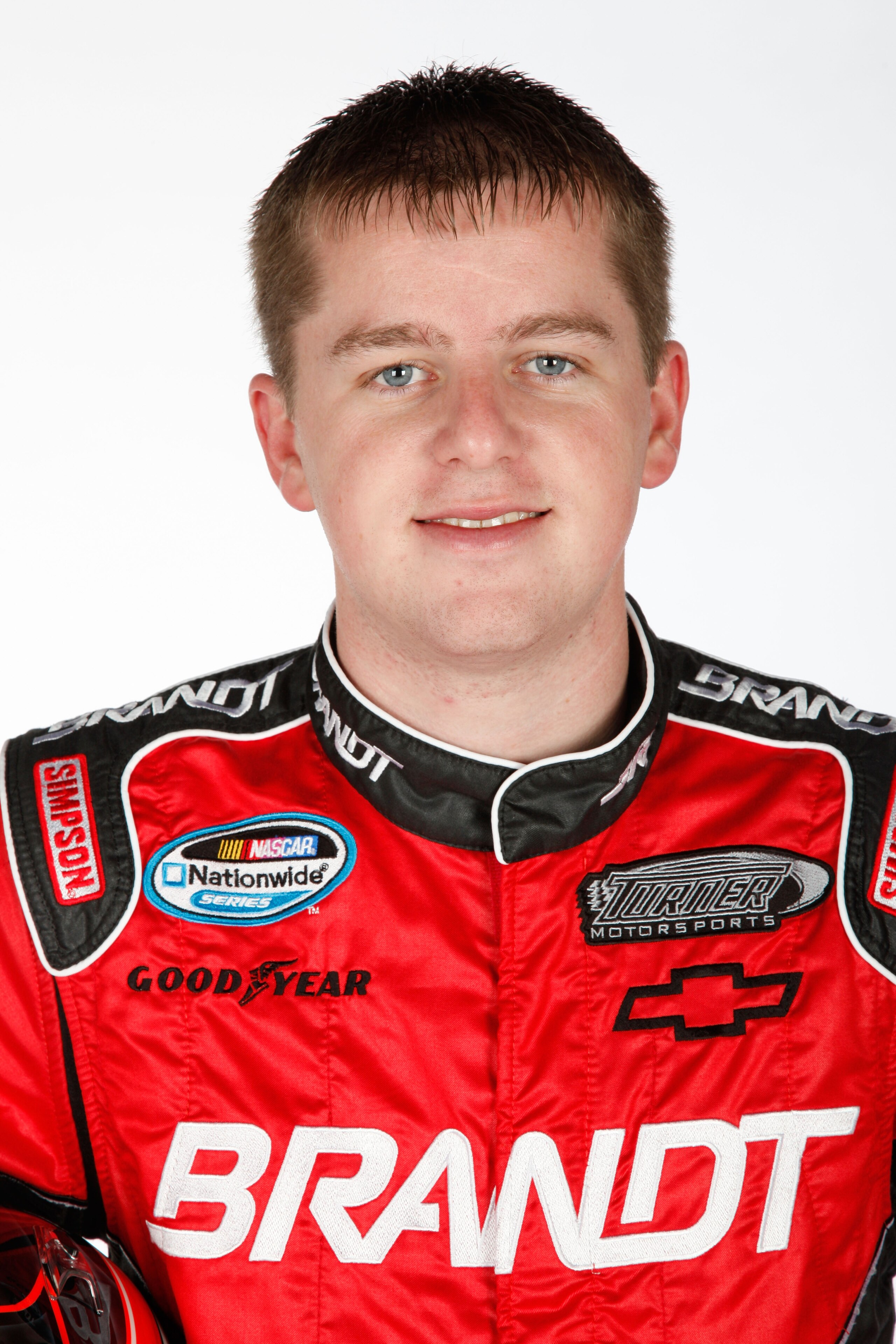 DAYTONA BEACH, FL - FEBRUARY 10:  Justin Allgaier, driver of the #31 BRANDT Chevrolet, poses during the 2011 NASCAR Nationwide Series Media Day at Daytona International Speedway on February 10, 2011 in Daytona Beach, Florida.  (Photo by Chris Graythen/Get