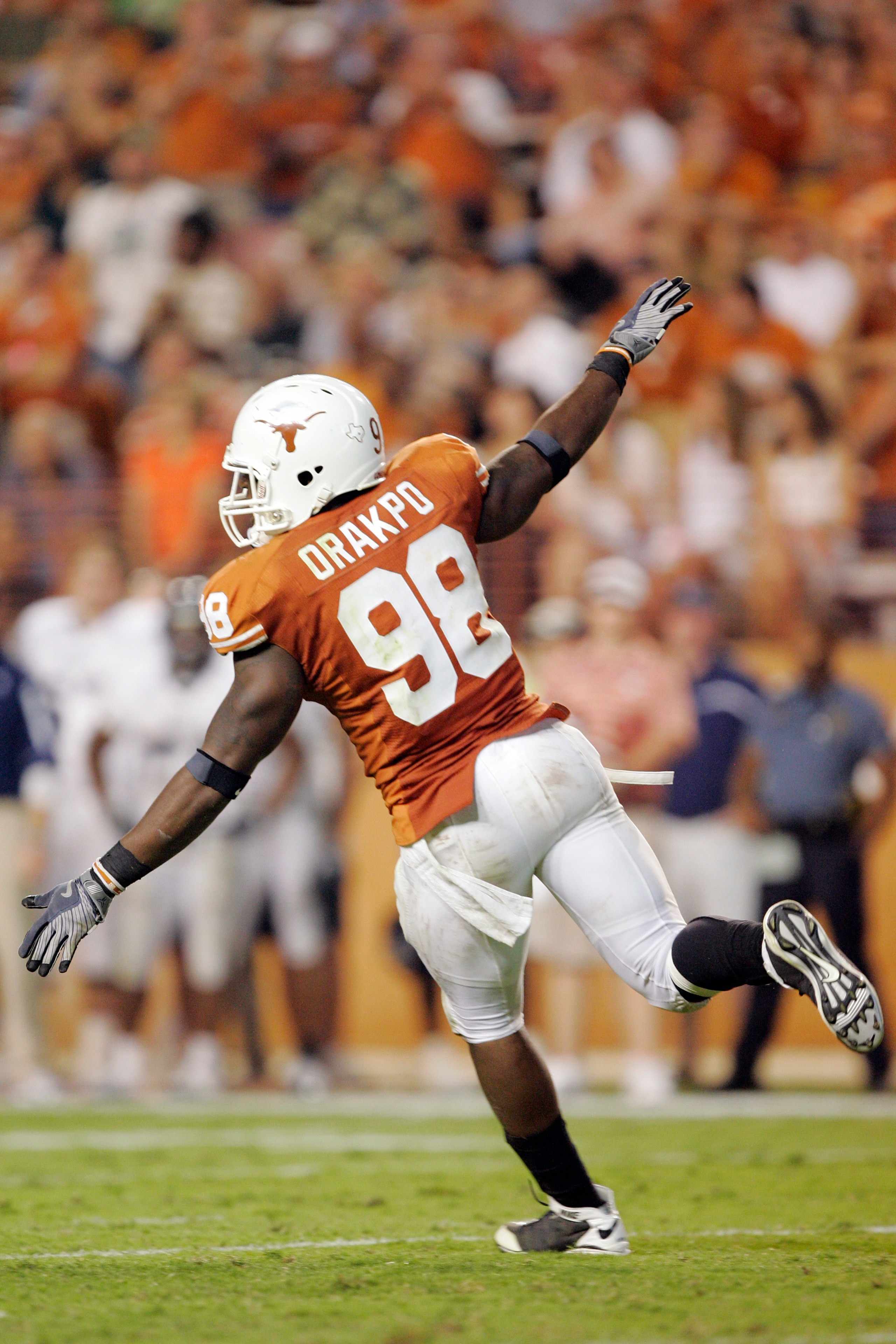 AUSTIN, TX - SEPTEMBER 20: Defensive end Brian Orakpo #98 of the Texas Longhorns celebrates after sacking quarterback Chase Clement #16 of the Rice Owls in the fourth quarter on September 20, 2008 at Darrell K Royal-Texas Memorial Stadium in Austin, Texa AUSTIN, TX - SEPTEMBER 20: Defensive end Brian Orakpo #98 of the Texas Longhorns celebrates after sacking quarterback Chase Clement #16 of the Rice Owls in the fourth quarter on September 20, 2008 at Darrell K Royal-Texas Memorial Stadium in Austin, Texa