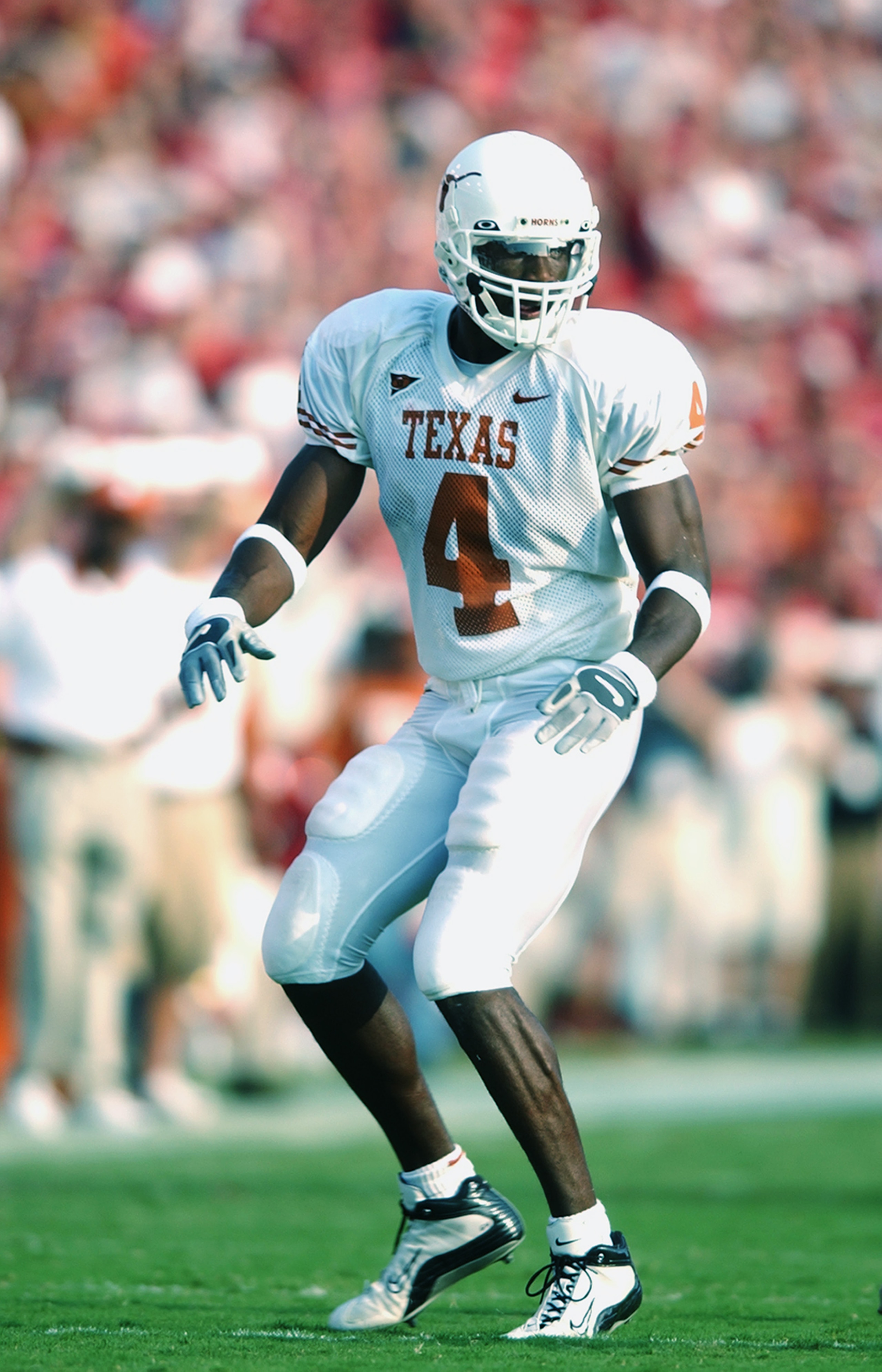 DALLAS - OCTOBER 12: Wide receiver Roy Williams #4 of the Texas Longhorns stands on the field during the Red River Shootout against the Oklahoma Sooners at the Cotton Bowl on October 12, 2002 in Dallas, Texas. Oklahoma won 35-24. (Photo by Harry How/Ge DALLAS - OCTOBER 12: Wide receiver Roy Williams #4 of the Texas Longhorns stands on the field during the Red River Shootout against the Oklahoma Sooners at the Cotton Bowl on October 12, 2002 in Dallas, Texas. Oklahoma won 35-24. (Photo by Harry How/Ge