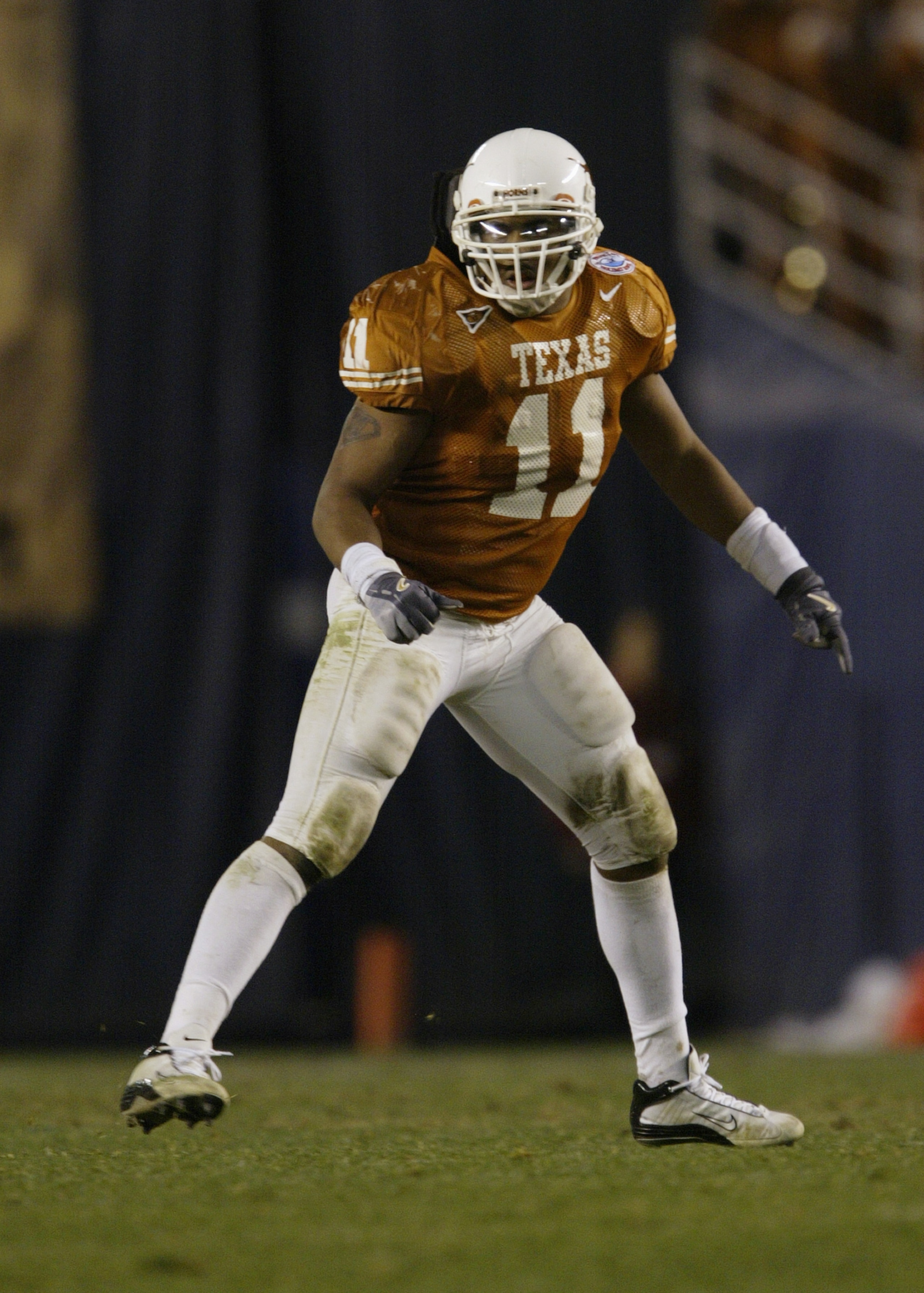 SAN DIEGO - DECEMBER 30: Linebacker Derrick Johnson #11 of the University of Texas Longhorns reacts on the field during the game against the Washington State Cougars in the Pacific Life Holiday Bowl on December 30, 2003 at Qualcomm Stadium in San Diego, SAN DIEGO - DECEMBER 30: Linebacker Derrick Johnson #11 of the University of Texas Longhorns reacts on the field during the game against the Washington State Cougars in the Pacific Life Holiday Bowl on December 30, 2003 at Qualcomm Stadium in San Diego,