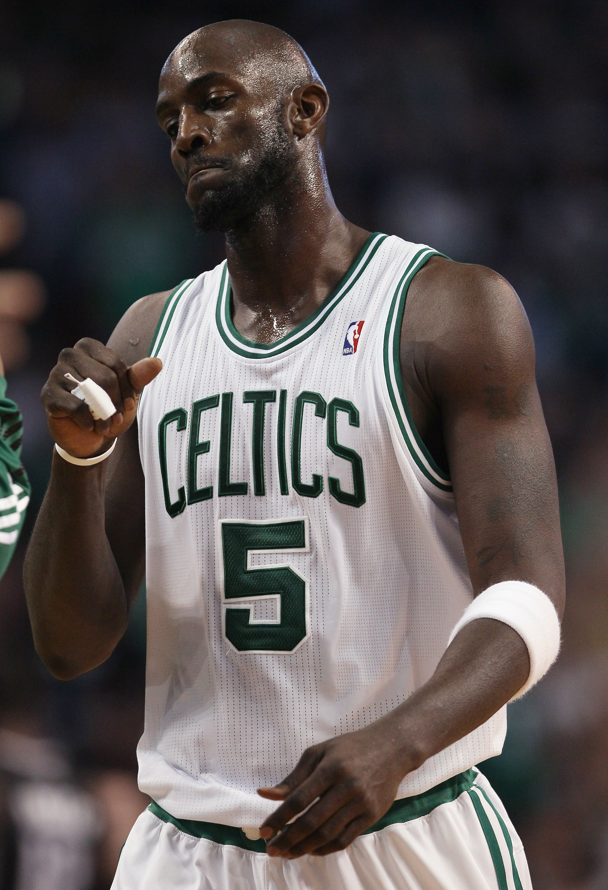 BOSTON, MA - JANUARY 17:  Kevin Garnett #5 of the Boston Celtics heads for the bench during a time out in the first quarter against the Orlando Magic on January 17, 2011 at the TD Garden in Boston, Massachusetts.  NOTE TO USER: User expressly acknowledges