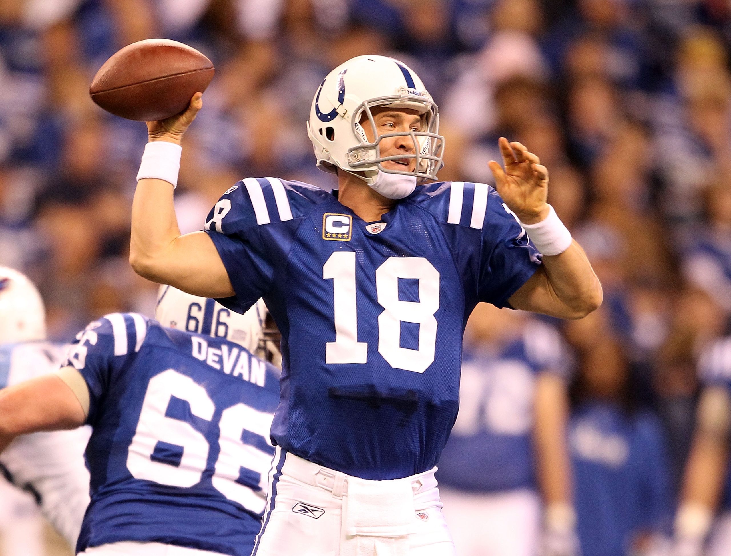 INDIANAPOLIS - JANUARY 02: Peyton Manning #18 of the Indianapolis Colts throws a pass during NFL game against the Tennessee Titans at Lucas Oil Stadium on January 2, 2011 in Indianapolis, Indiana.  (Photo by Andy Lyons/Getty Images)