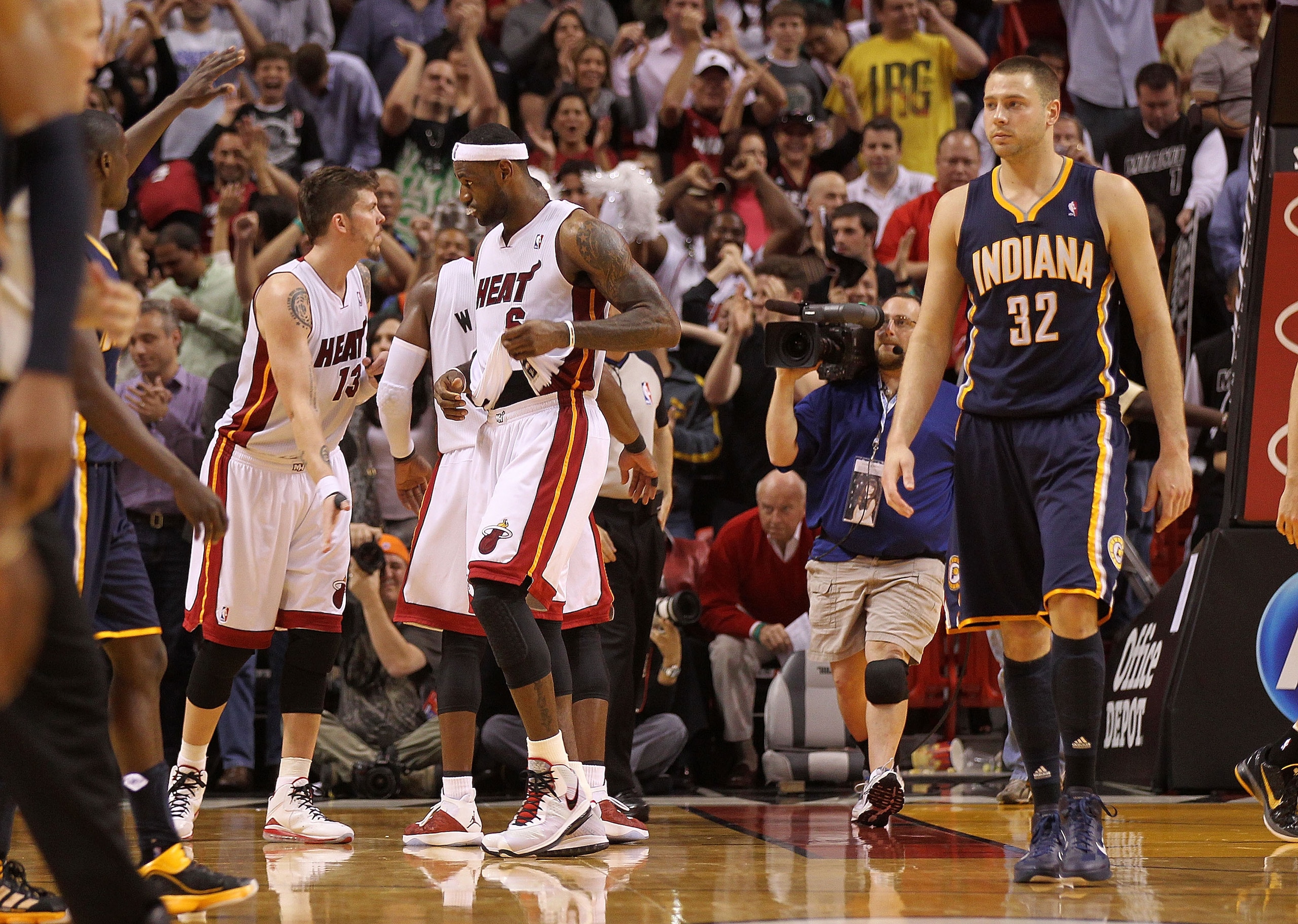 MIAMI, FL - FEBRUARY 08: Mike Miller #13 of the Miami Heat congratulates LeBron James #6 after winning a game against the Indiana Pacers at American Airlines Arena on February 8, 2011 in Miami, Florida. NOTE TO USER: User expressly acknowledges and agrees