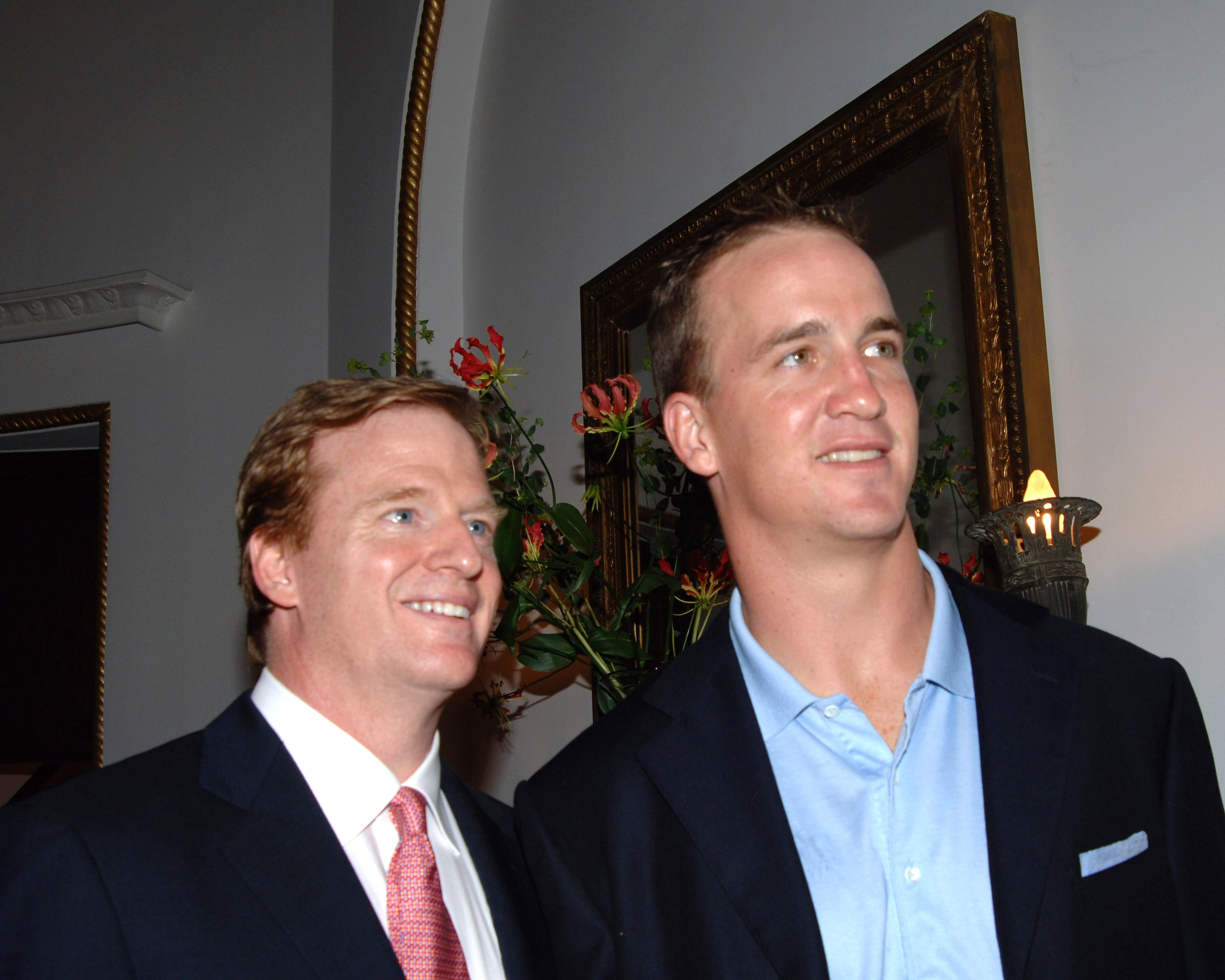 NFL chief operating officer Roger Goodell and  Indianapolis Colts quarterback Peyton Manning  at a reception  at the United States Embassy in Tokyo Aug. 5. (Photo by A. Messerschmidt/Getty Images)