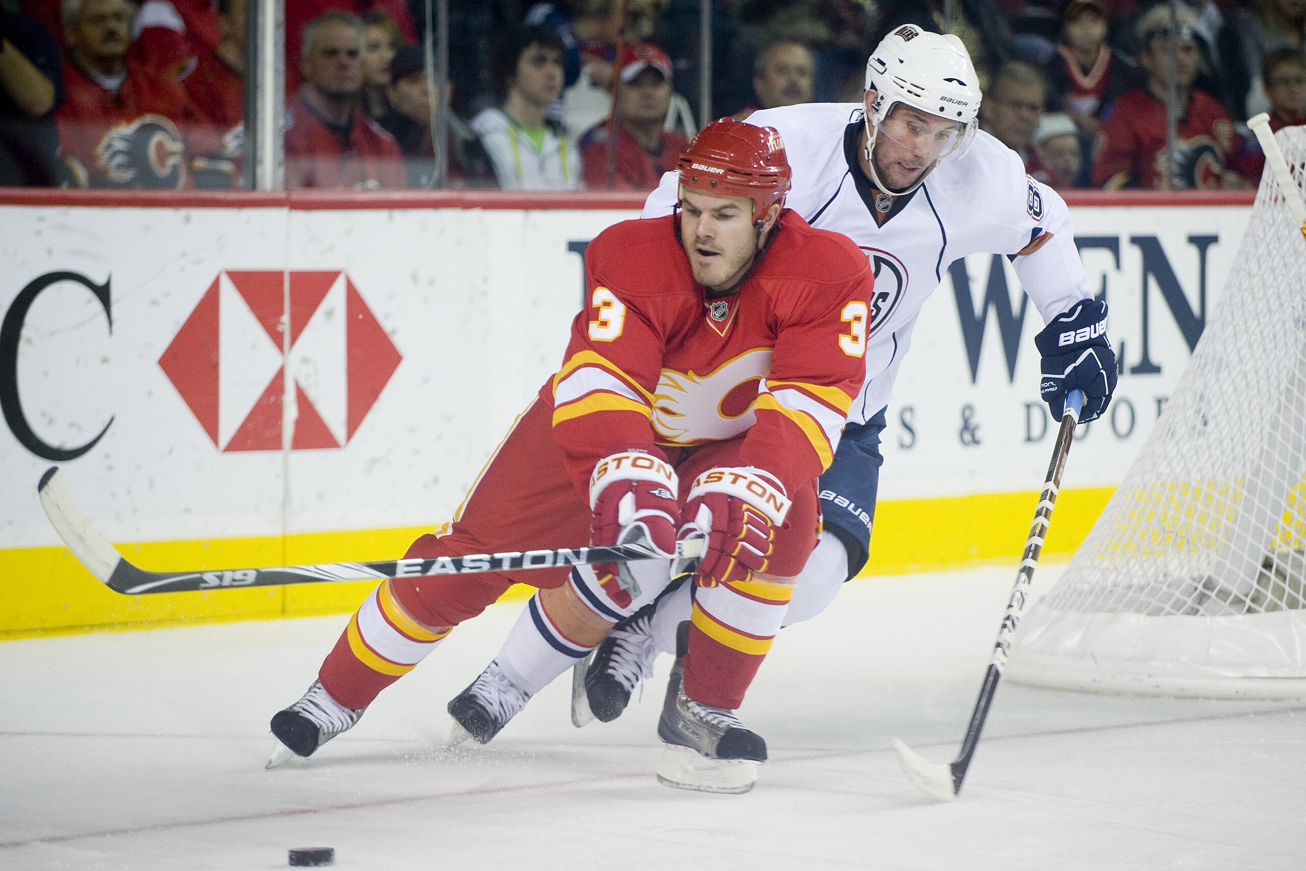 EDMONTON, CANADA - OCTOBER 16:  Florida Panthers defenseman Clay Wilson #3 protects the puck from a pressuring Edmonton Oilers center Sam Gagner #89 at the Scotiabank Saddledome  on October 16, 2010 in Calgary, Alberta, Canada.  The Flames beat the Oilers