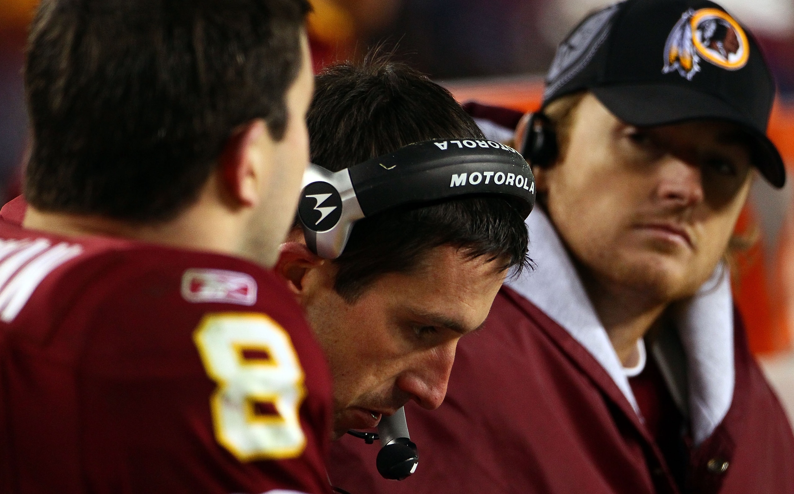 LANDOVER, MD - JANUARY 02:  Offensive coordinator Kyle Shanahan (C) of the Washington Redskins works on the sideline with quarterbacks Rex Grossman #8 and John Beck #3 in the fourth quarter of a game against the New York Giants at FedEx Field on January 2