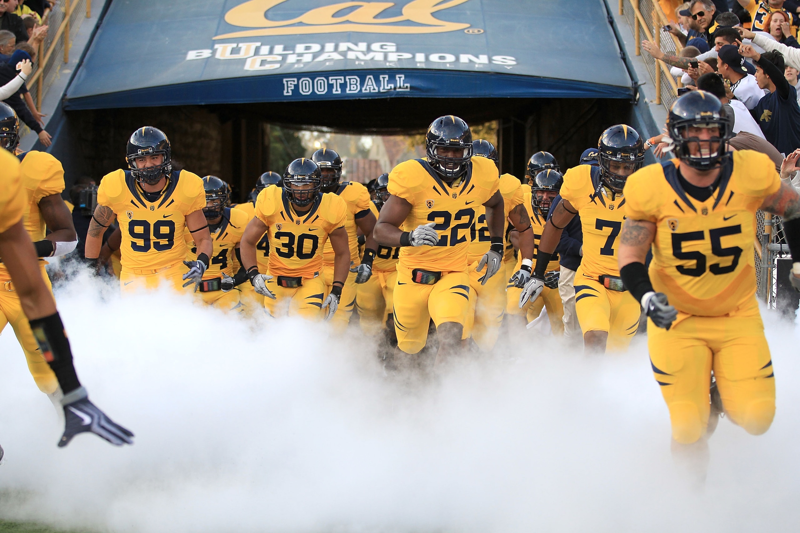 BERKELEY, CA - NOVEMBER 13:  Tthe California Golden Bears enter the stadium for their game against the Oregon Ducks at California Memorial Stadium on November 13, 2010 in Berkeley, California.  (Photo by Ezra Shaw/Getty Images)