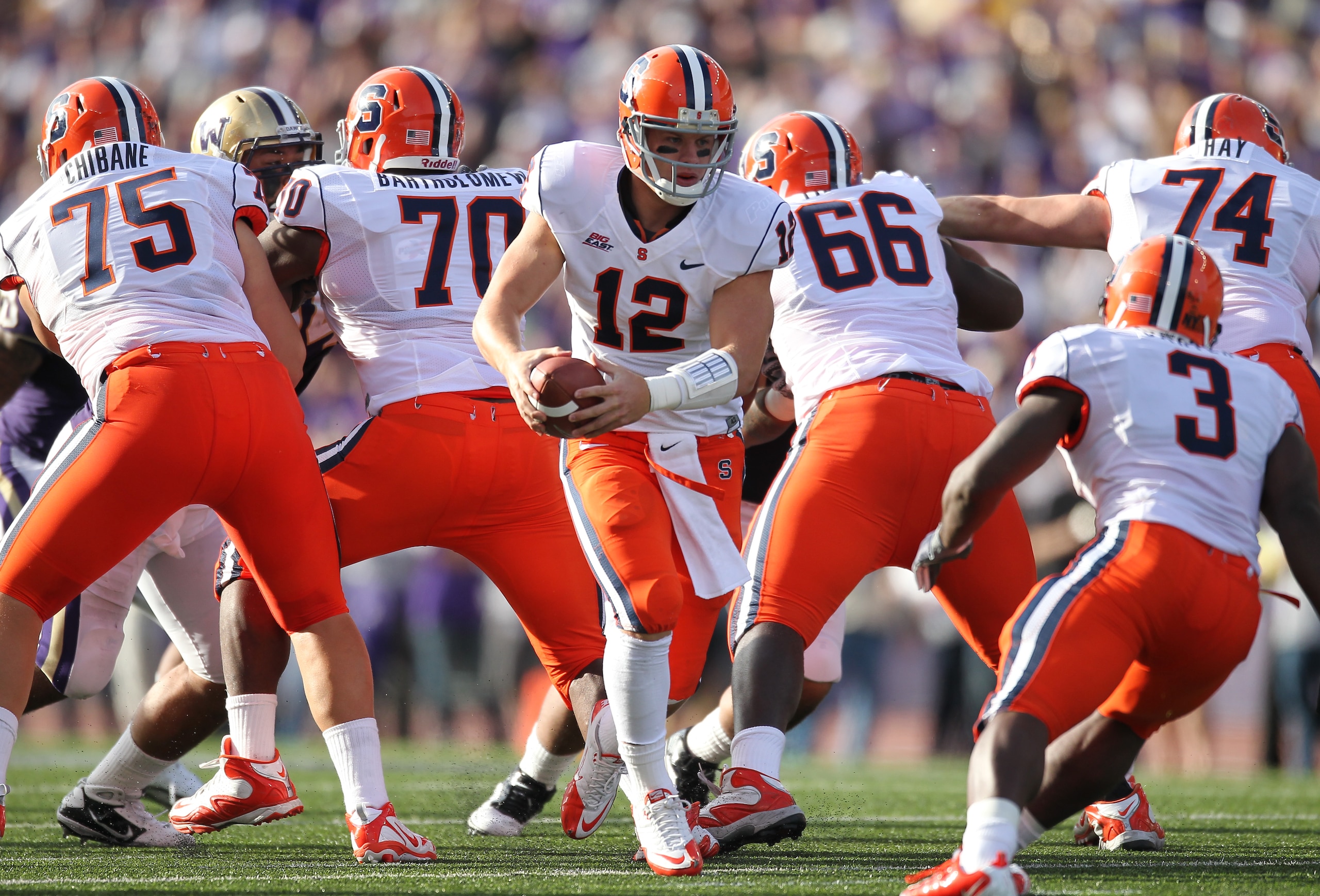SEATTLE - SEPTEMBER 11:  Quarterback Ryan Nassib #12 of the Syracuse Orange drops back to pass against the Washington Huskies on September 11, 2010 at Husky Stadium in Seattle, Washington. (Photo by Otto Greule Jr/Getty Images)