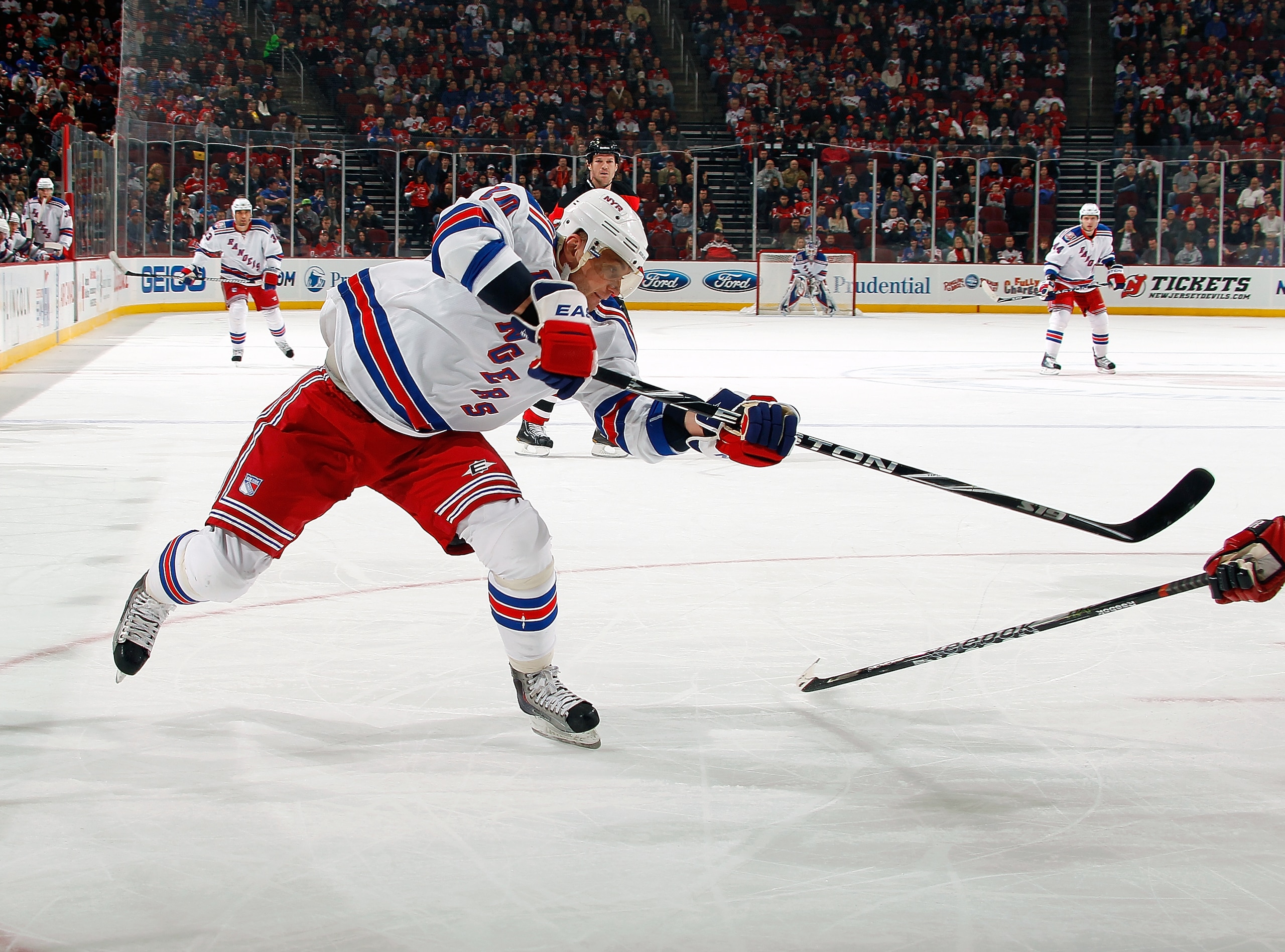 NEWARK, NJ - DECEMBER 29: Marion Gaborik #10 of the New York Rangers takes a shot during a game against the New Jersey Devils on December 29, 2010 at the Prudential Center in Newark, New Jersey. The Rangers won 3-1.  (Photo by Lou Capozzola/Getty Images)