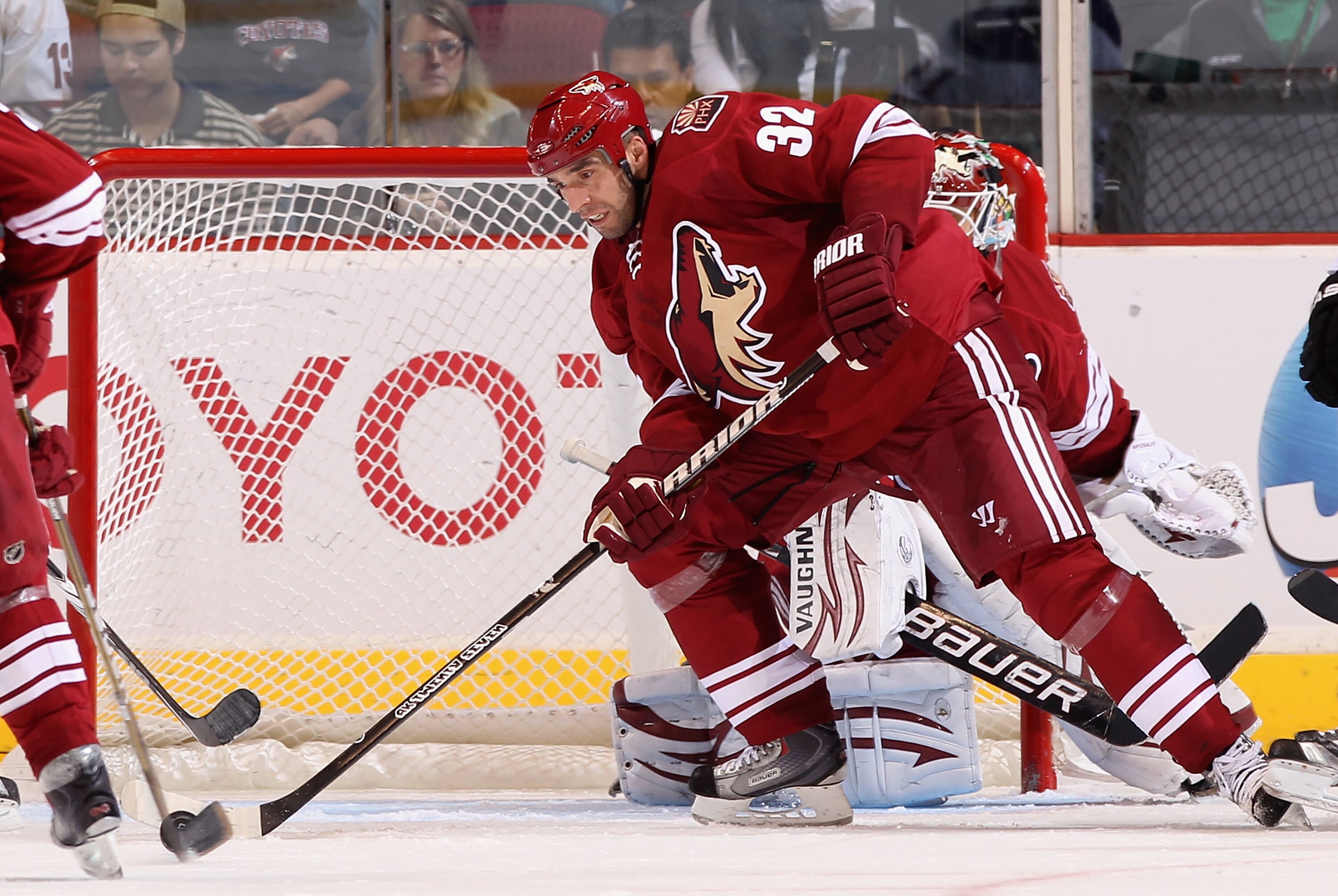 GLENDALE, AZ - JANUARY 22:  Michal Rozsival #32 of the Phoenix Coyotes skates with the puck during the NHL game at Jobing.com Arena on January 22, 2011 in Glendale, Arizona.  The Kings defeated the Coyotes 4-3.  (Photo by Christian Petersen/Getty Images)
