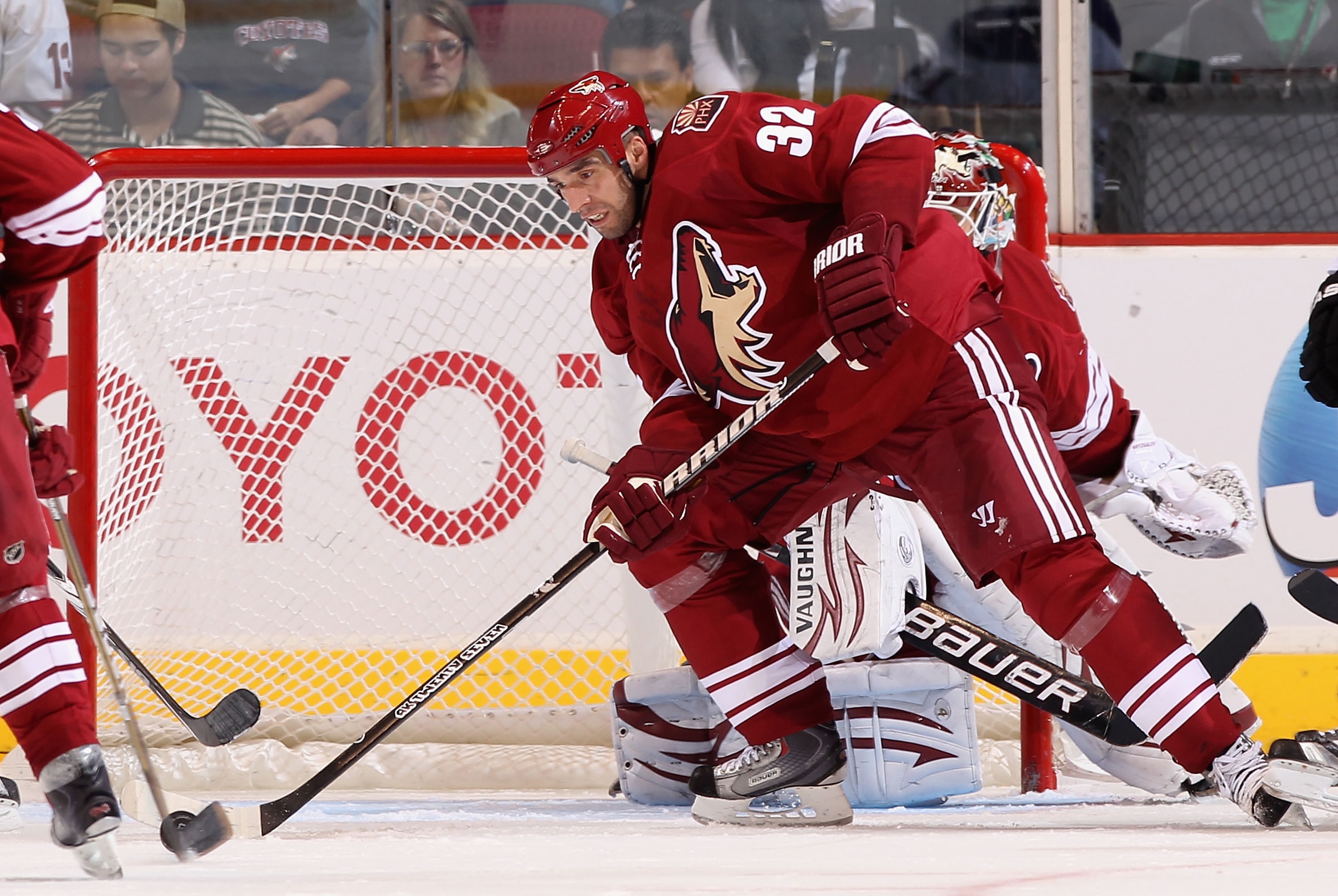 GLENDALE, AZ - JANUARY 22:  Michal Rozsival #32 of the Phoenix Coyotes skates with the puck during the NHL game at Jobing.com Arena on January 22, 2011 in Glendale, Arizona.  The Kings defeated the Coyotes 4-3.  (Photo by Christian Petersen/Getty Images)