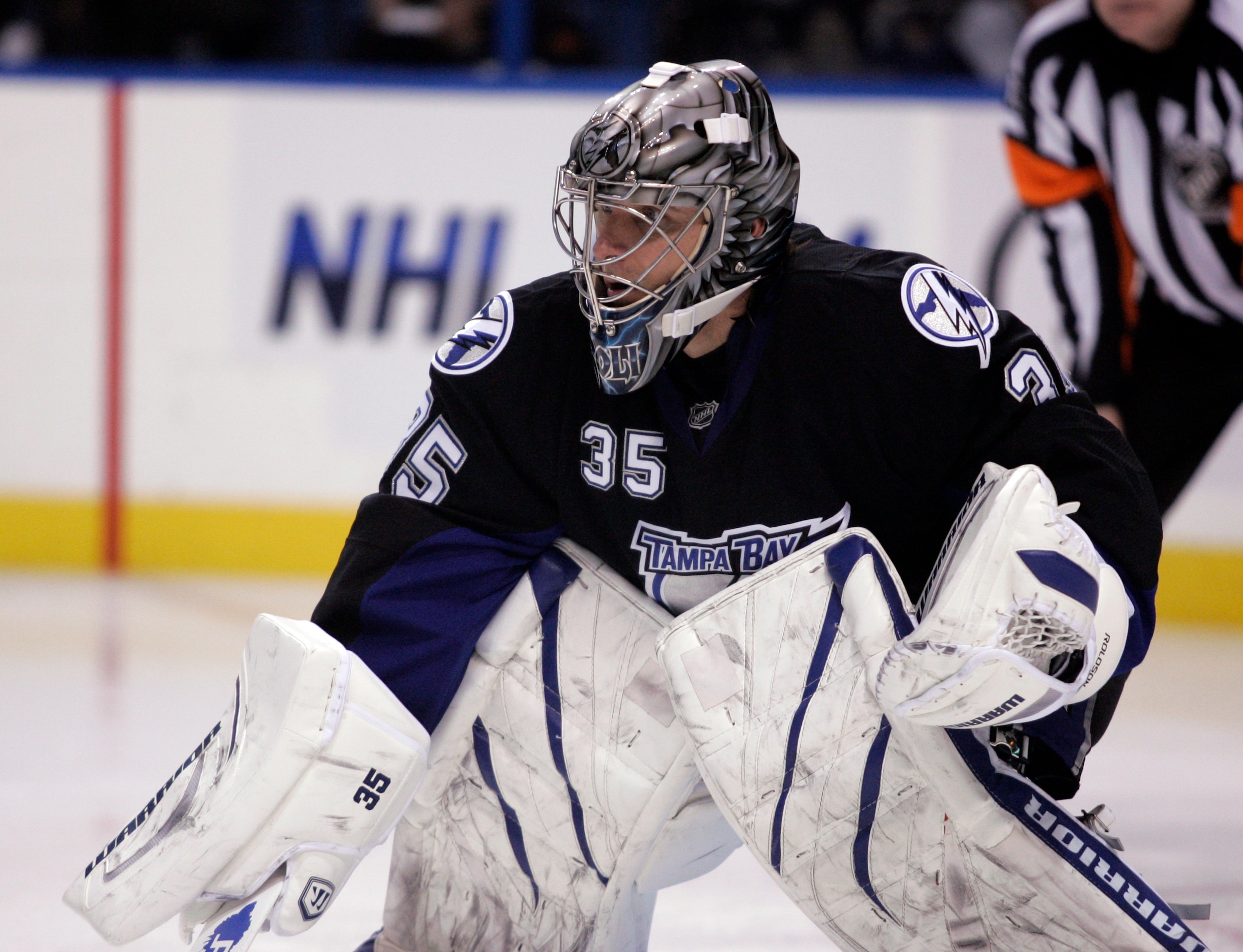 TAMPA, FL - JANUARY 25: Dwayne Roloson #35 of the Tampa Bay Lightning protects the net against the Toronto Maple Leafs at St. Pete Times Forum on January 25, 2011 in Tampa, Florida. The Lightning defeated the Leafs 2-0. (Photo by Justin K. Aller/Getty Ima