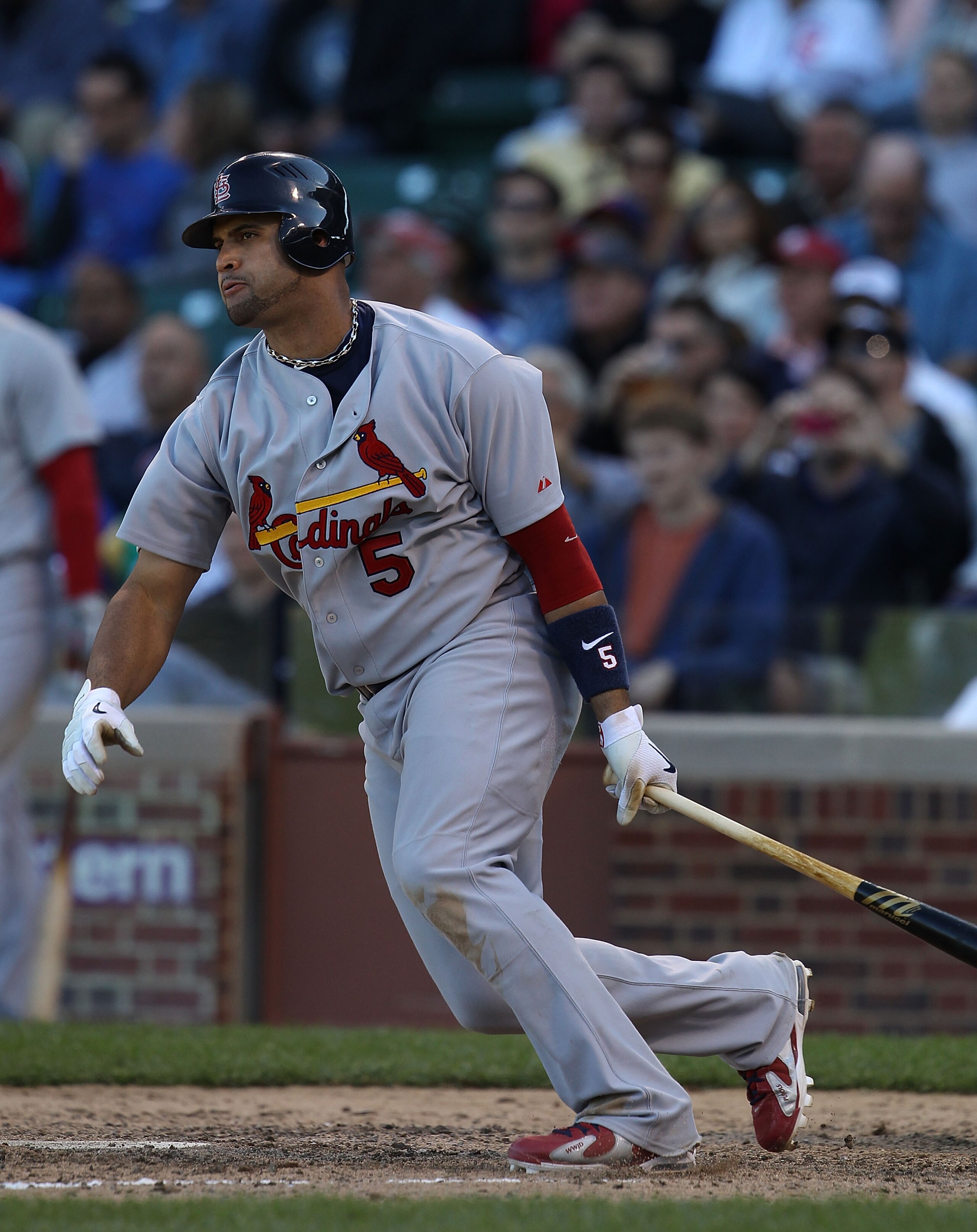 CHICAGO - SEPTEMBER 24: Albert Pujols #5 of the St. Louis Cardinals hits a single in the 9th inning against the Chicago Cubs at Wrigley Field on September 24, 2010 in Chicago, Illinois. The Cardinals defeated the Cubs 7-1. (Photo by Jonathan Daniel/Getty CHICAGO - SEPTEMBER 24: Albert Pujols #5 of the St. Louis Cardinals hits a single in the 9th inning against the Chicago Cubs at Wrigley Field on September 24, 2010 in Chicago, Illinois. The Cardinals defeated the Cubs 7-1. (Photo by Jonathan Daniel/Getty