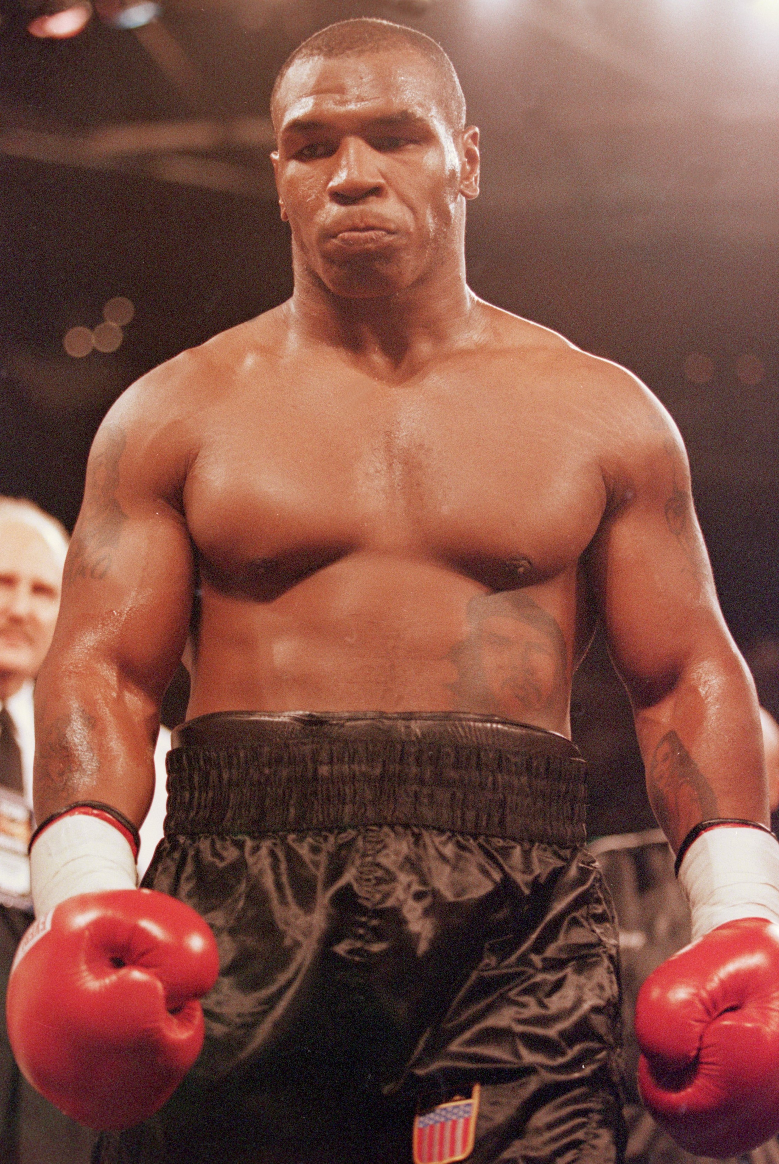 20 Oct 2000:  Mike Tyson walks to a corner during the fight against Andrew Golota at the Palace of Auburn Hills in Auburn, Michigan. Tyson defeated Golota in the third round by technical knockout.Mandatory Credit: Al Bello  /Allsport