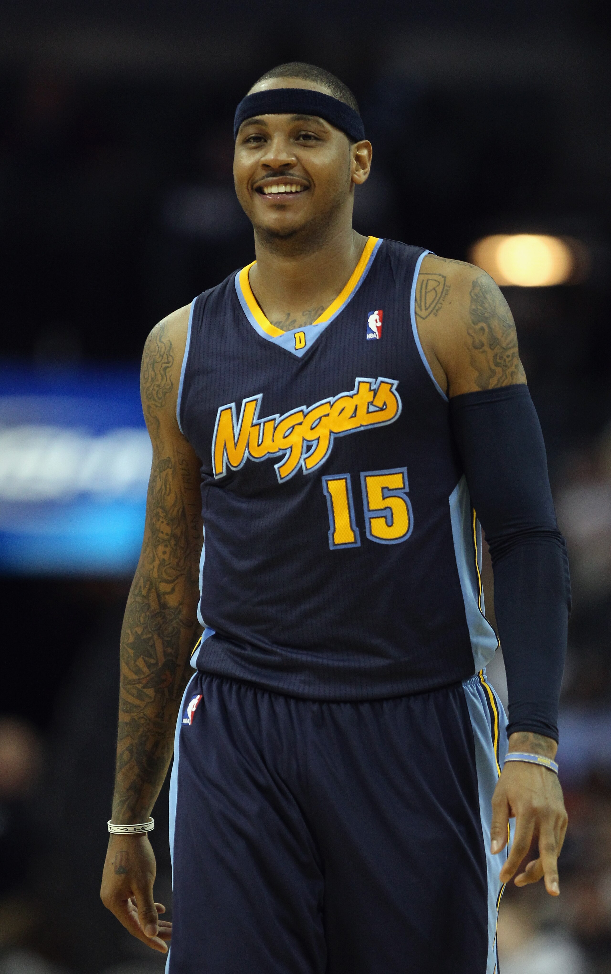 CHARLOTTE, NC - DECEMBER 07:  Carmelo Anthony #15 of the Denver Nuggets watches on against the Charlotte Bobcats during their game at Time Warner Cable Arena on December 7, 2010 in Charlotte, North Carolina.  NOTE TO USER: User expressly acknowledges and