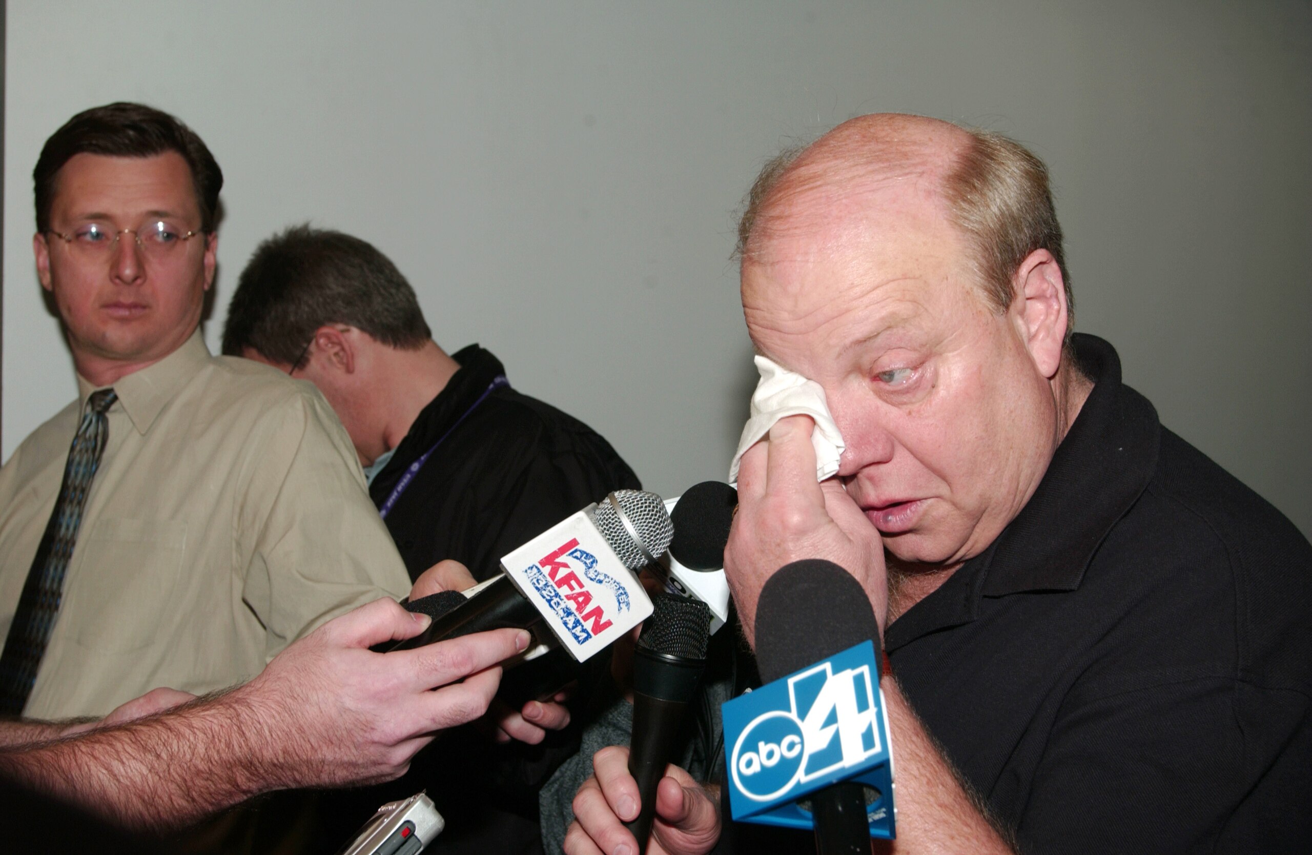 SALT LAKE CITY - MAY 2:  An emotional owner Larry H. Miller of the Utah Jazz wipes away a tear as he speaks to the media following John Stockton's retirement from NBA basketball on May 2, 2003 in Salt Lake City, Utah.  Stockton played 19 seasons with the 