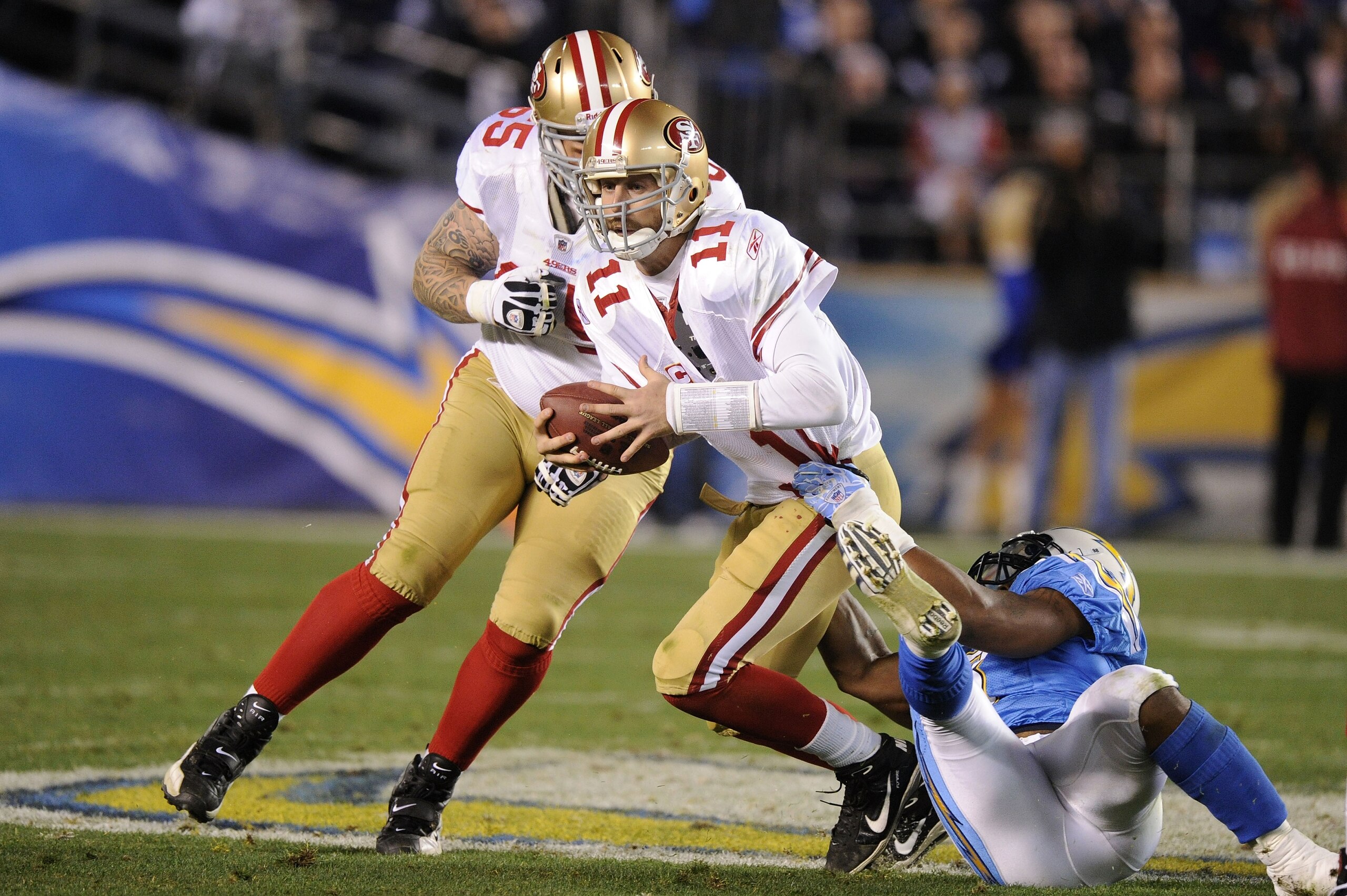 SAN DIEGO, CA - DECEMBER 16: Quarterback Alex Smith #11 of the San Francisco 49ers is sacked by linebacker Antwan Barnes #98 of the San Diego Chargers in the fourth quarter at Qualcomm Stadium on December 16, 2010 in San Diego, California. (Photo by Har SAN DIEGO, CA - DECEMBER 16: Quarterback Alex Smith #11 of the San Francisco 49ers is sacked by linebacker Antwan Barnes #98 of the San Diego Chargers in the fourth quarter at Qualcomm Stadium on December 16, 2010 in San Diego, California. (Photo by Har