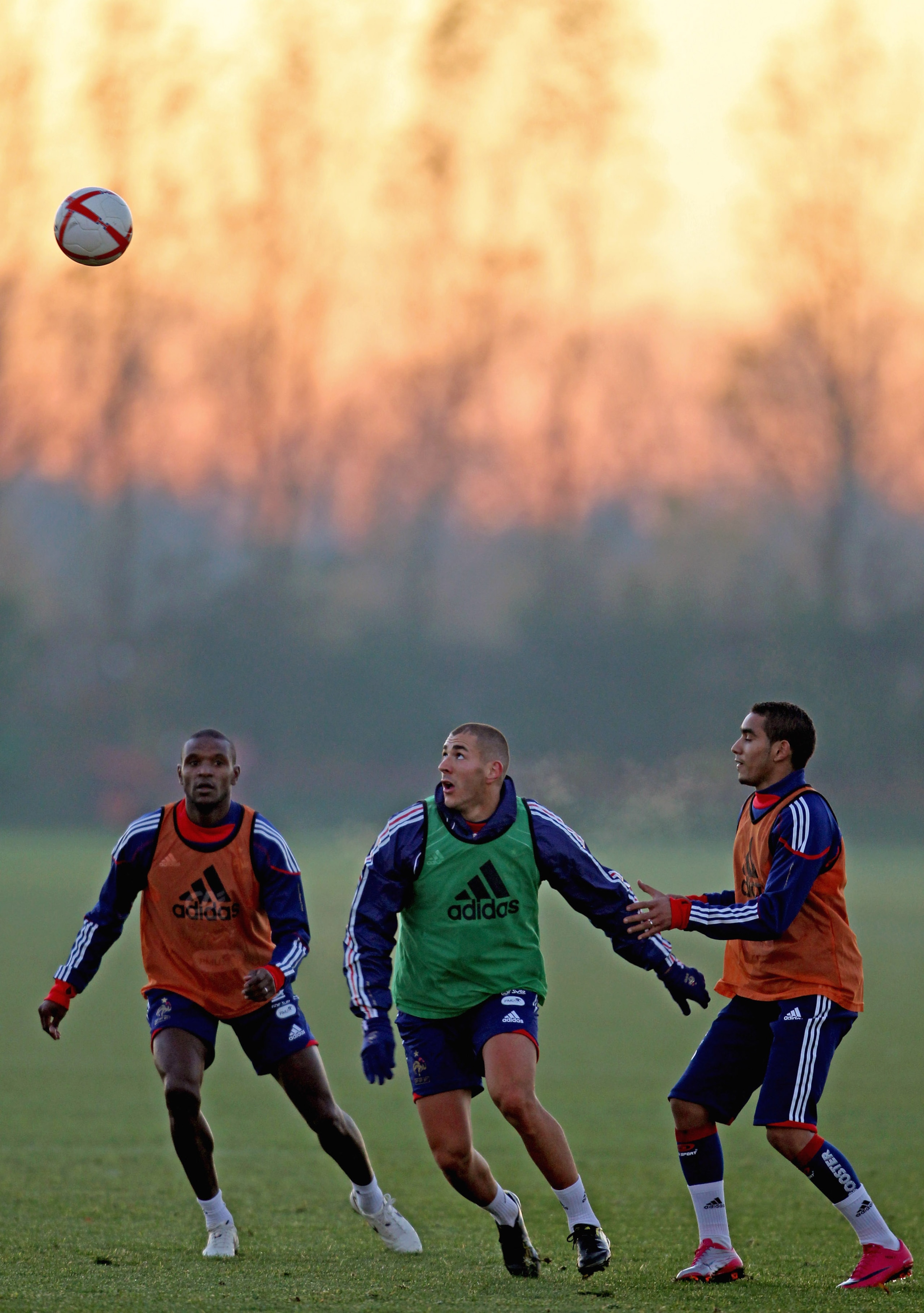 LONDON COLNEY, ENGLAND - NOVEMBER 15: Eric Abidal (L), Dimitri Payet (R) and Karim Benzema (C) in action during a France training session ahead of their international match against England on November 15, 2010, London Colney, England. (Photo by Scott He LONDON COLNEY, ENGLAND - NOVEMBER 15: Eric Abidal (L), Dimitri Payet (R) and Karim Benzema (C) in action during a France training session ahead of their international match against England on November 15, 2010, London Colney, England. (Photo by Scott He