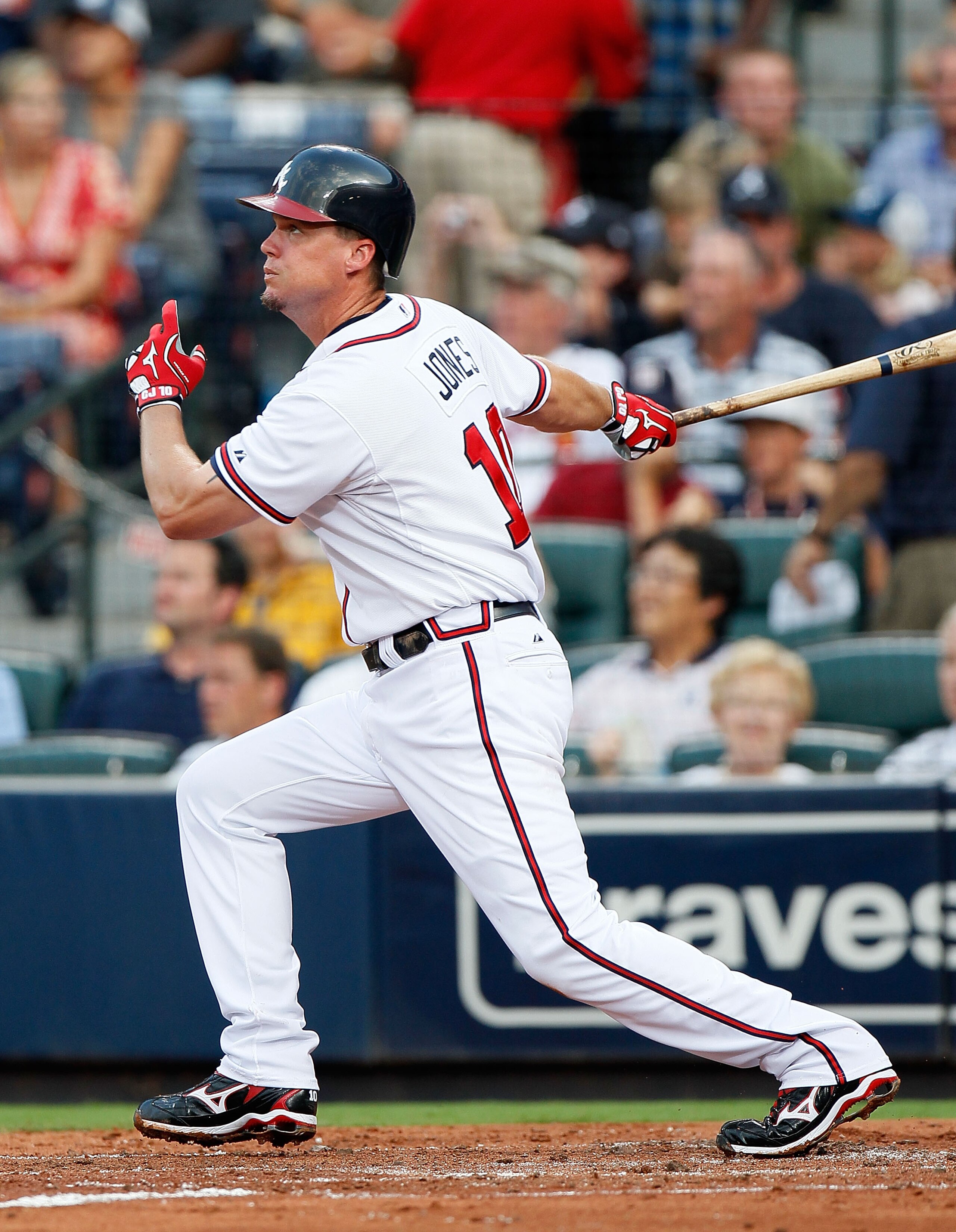 ATLANTA - JULY 15:  Chipper Jones #10 of the Atlanta Braves hits a solo homer in the third inning against the Milwaukee Brewers at Turner Field on July 15, 2010 in Atlanta, Georgia.  (Photo by Kevin C. Cox/Getty Images)