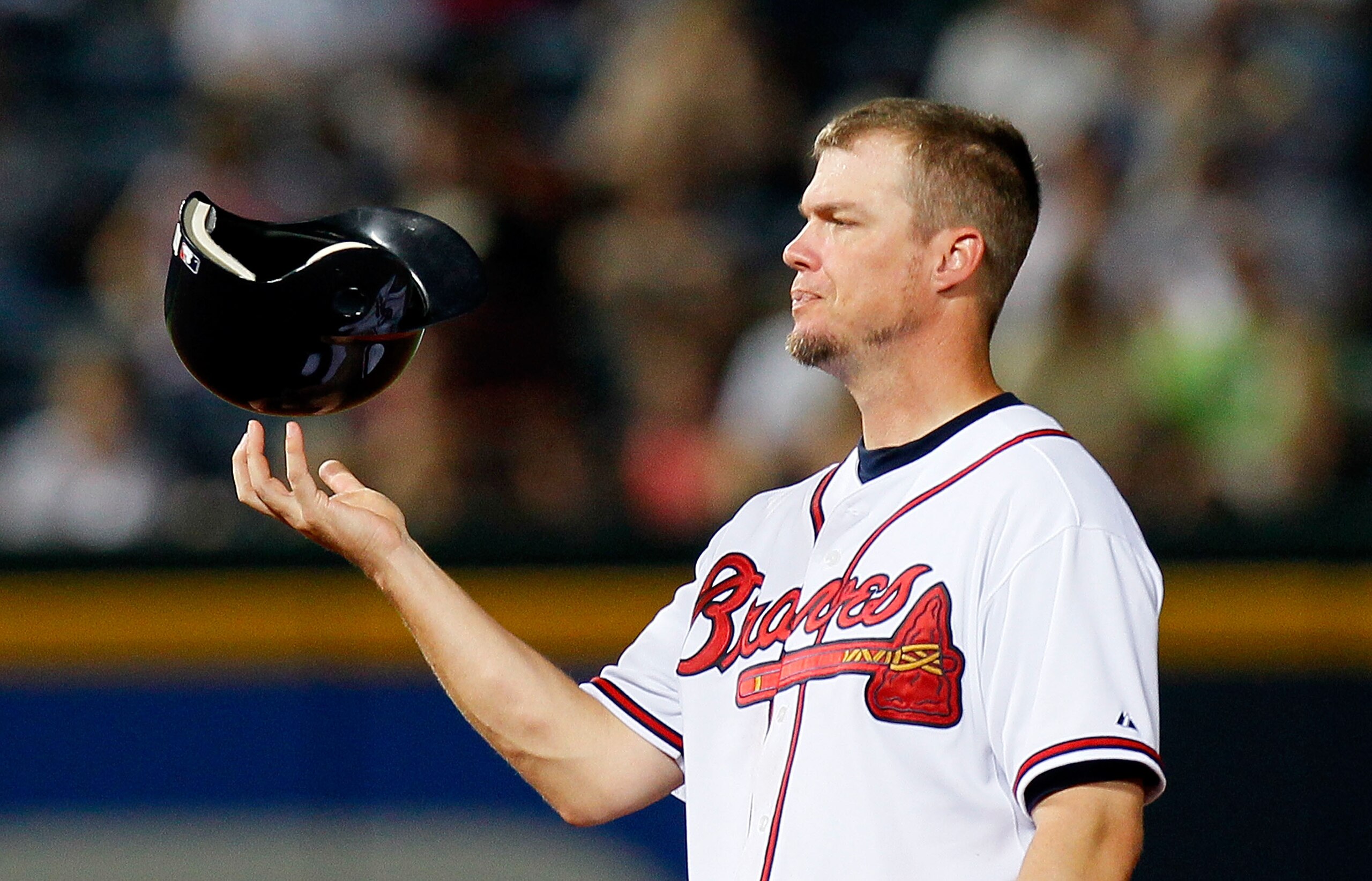 ATLANTA - JUNE 30:  Chipper Jones #10 of the Atlanta Braves twirls his helmet on his fingers during a pitching change by the Washington Nationals at Turner Field on June 30, 2010 in Atlanta, Georgia.  (Photo by Kevin C. Cox/Getty Images)