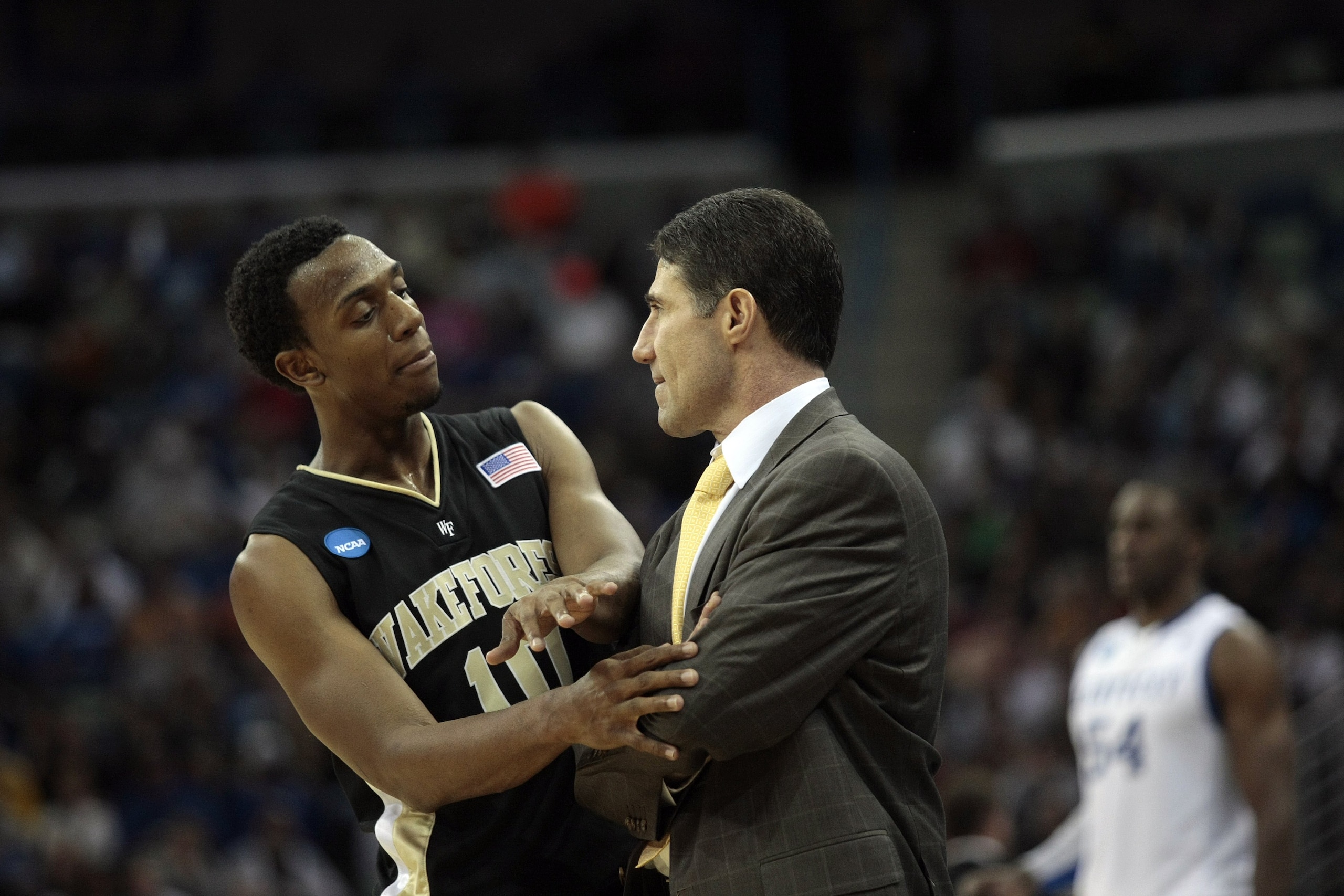 NEW ORLEANS - MARCH 20:  Ishmael Smith #10 talks with coach Dino Gaudio of the Wake Forest Deacon Demons during the second round of the 2010 NCAA mens basketball tournament at the New Orleans Arena on March 20, 2010 in New Orleans, Louisiana.  (Photo by D