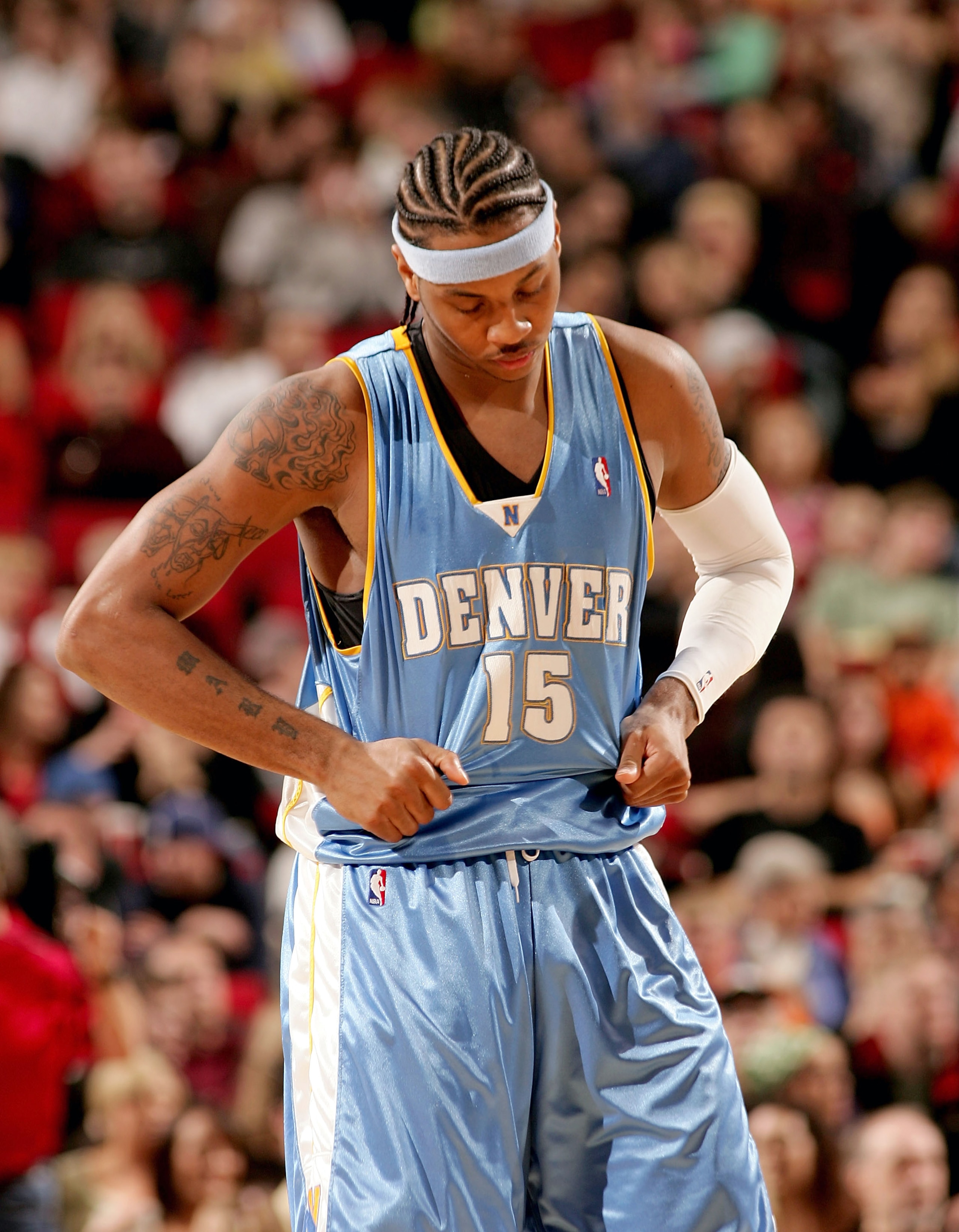 PORTLAND, OR - APRIL 2:  Carmelo Anthony #15 of the Denver Nuggets appears dejected during the game against the Portland Trail Blazers on April 2, 2005 at the Rose Garden in Portland, Oregon. The Nuggets defeated the Blazers 103-97.  NOTE TO USER: User ex