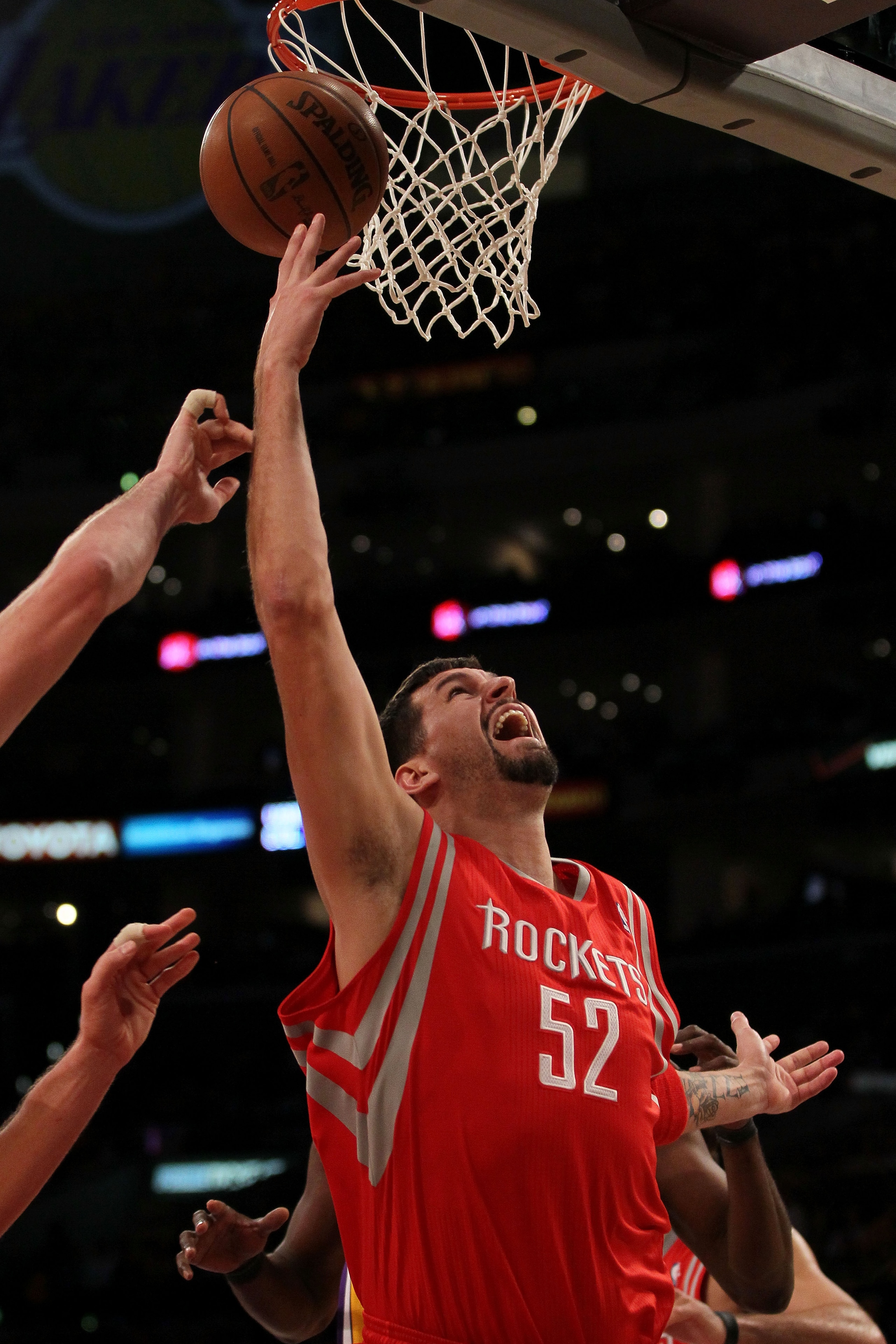 LOS ANGELES, CA - OCTOBER 26:  Brad Miller #52 of the Houston Rockets takes a shot against the Los Angeles Lakers during their game at Staples Center on October 26, 2010 in Los Angeles, California. NOTE TO USER: User expressly acknowledges and agrees that