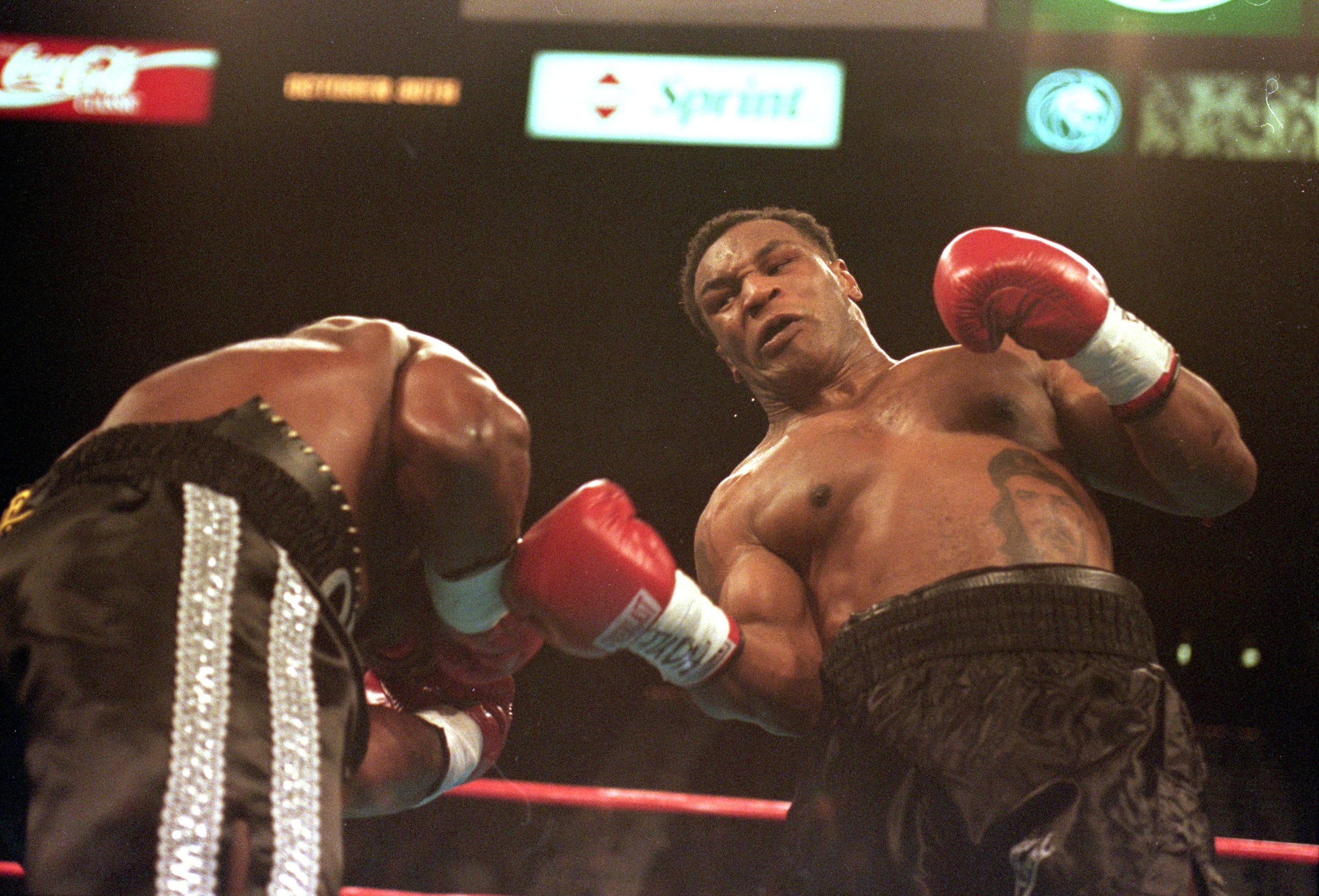 23 Oct 1999: Mike Tyson lands right upper -cut during the fight against Orlin Norris at the MGM Grand Hotel in Las Vegas, Nevada. The fight ended in a no contest.