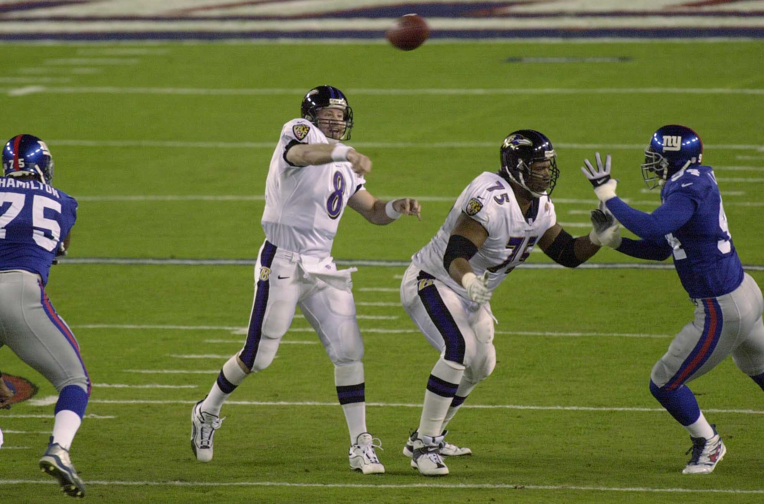 28 Jan 2001: Trent Dilfer #8 of the Baltimore Ravens throws downfield against the New York Giants during Super Bowl XXXV at Raymond James Stadium in Tampa, Florida.  DIGITAL IMAGE. Mandatory Credit: Doug Pensinger/ALLSPORT
