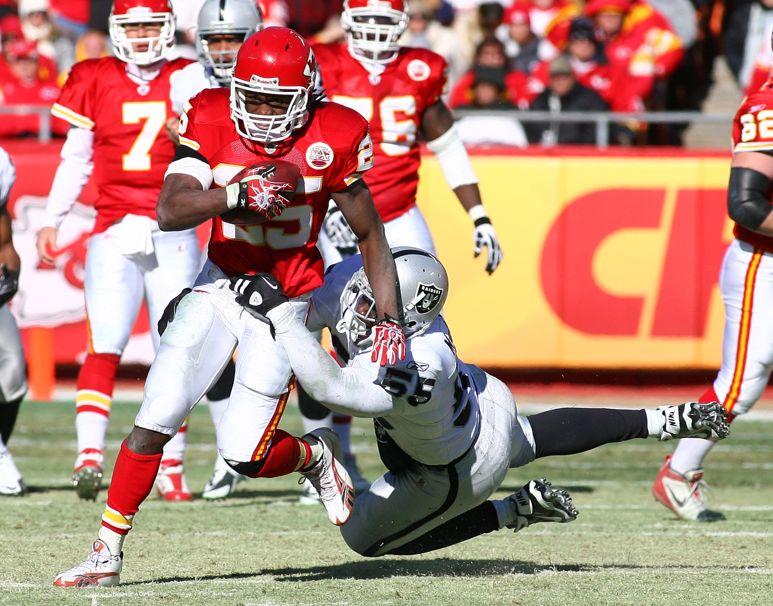 KANSAS CITY, MO - JANUARY 02:  Running back Jamaal Charles #25 of the Kansas City Chiefs is tackled by linebacker Rolando McClain #55 of the Oakland Raiders in a game at Arrowhead Stadium on January 2, 2011 in Kansas City, Missouri.  (Photo by Tim Umphrey
