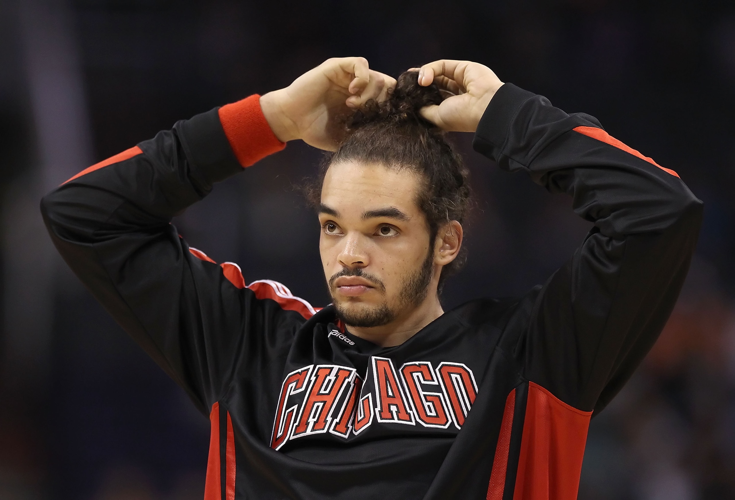 PHOENIX - NOVEMBER 24:  Joakim Noah #13 of the Chicago Bulls warms up before the NBA game against the Phoenix Suns at US Airways Center on November 24, 2010 in Phoenix, Arizona. The Bulls defeated the Suns 123-115 in double overtime.  NOTE TO USER: User e