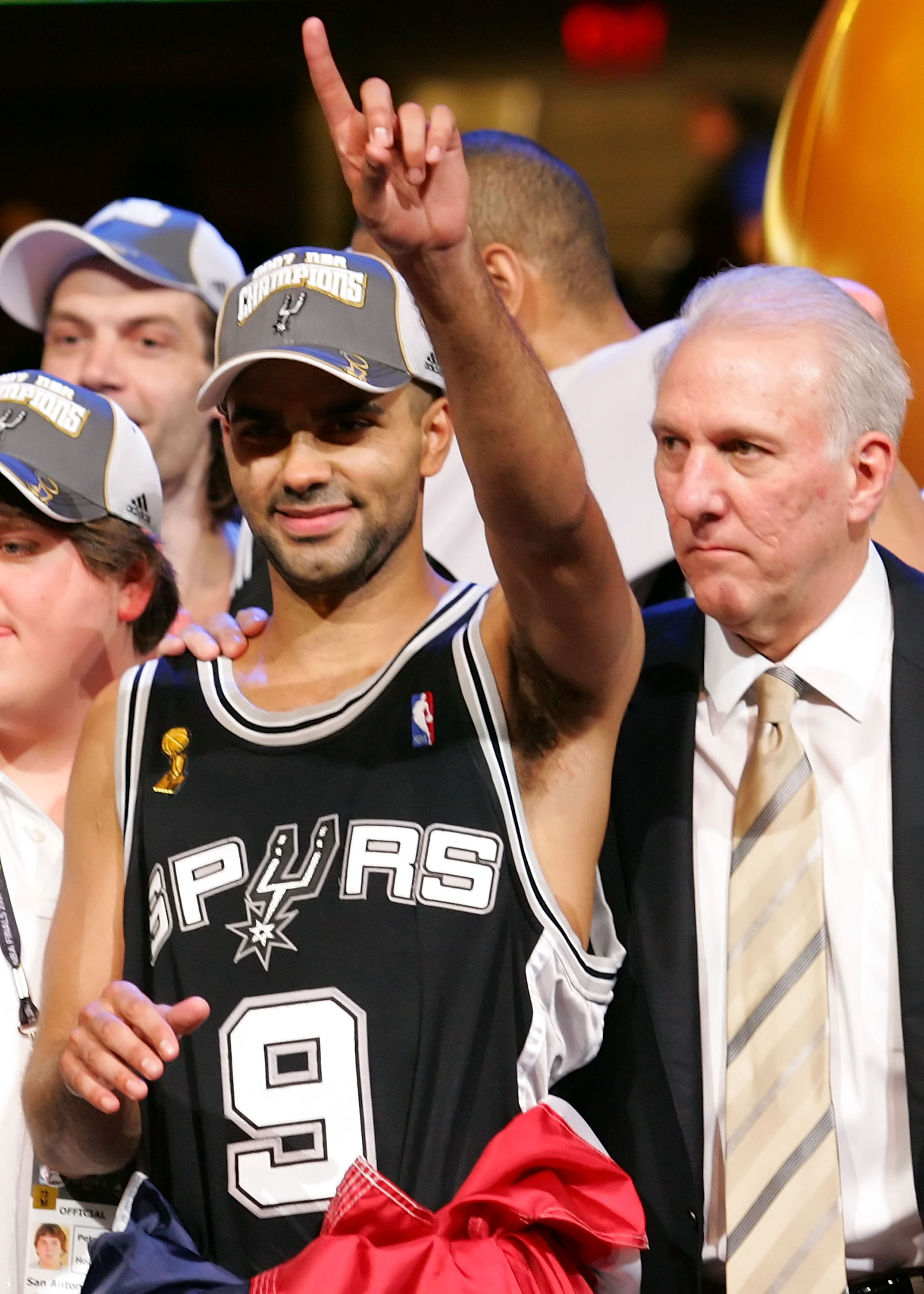 CLEVELAND - JUNE 14:  Tony Parker #9 and Head Coach Gregg Popovich of the San Antonio Spurs celebrates after the win in Game Four of the NBA Finals on June 14, 2007 at the Quicken Loans Arena in Cleveland, Ohio. NOTE TO USER: User expressly acknowledges a
