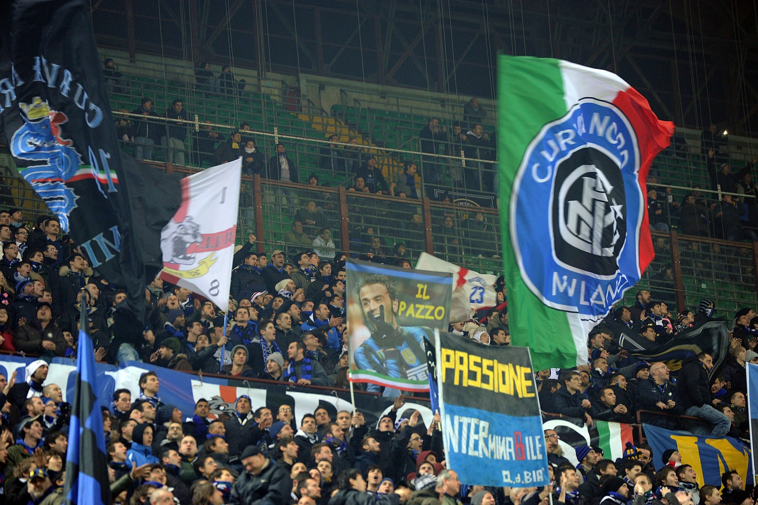 MILAN, ITALY - FEBRUARY 06: Fans of Inter during the Serie A match between FC Internazionale Milano and AS Roma at Stadio Giuseppe Meazza on February 6, 2011 in Milan, Italy. (Photo by Dino Panato/Getty Images) MILAN, ITALY - FEBRUARY 06: Fans of Inter during the Serie A match between FC Internazionale Milano and AS Roma at Stadio Giuseppe Meazza on February 6, 2011 in Milan, Italy. (Photo by Dino Panato/Getty Images)