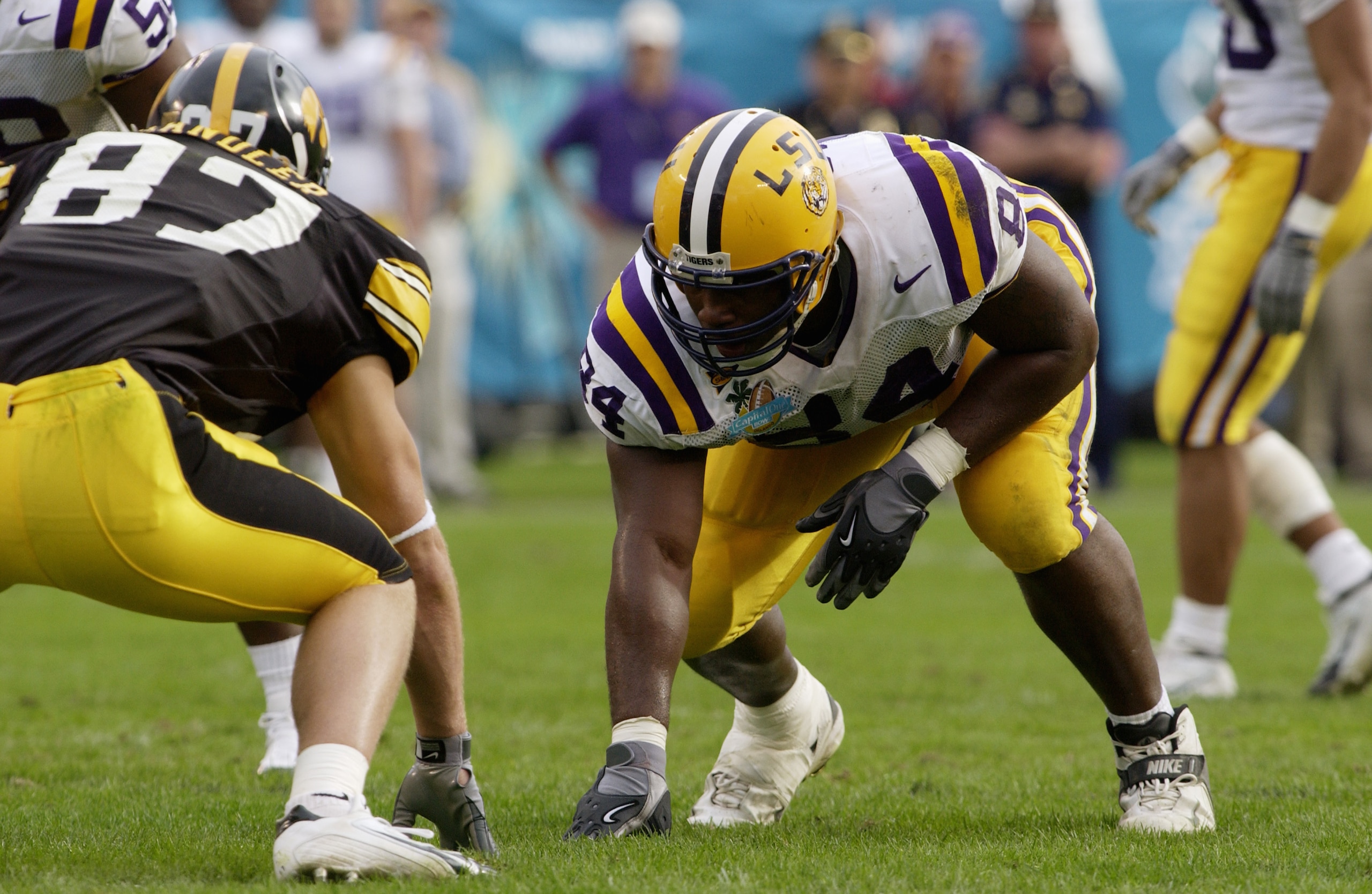 ORLANDO, FL - JANUARY 1:  Marcus Spears #84 of the LSU Tigers prepares for the snap during the Capital One Bowl game against the Iowa Hawkeyes at the Florida Citrus Bowl on January 1, 2005 in Orlando, Florida. The Hawkeyes won 30-25. (Photo by Matt Strosh