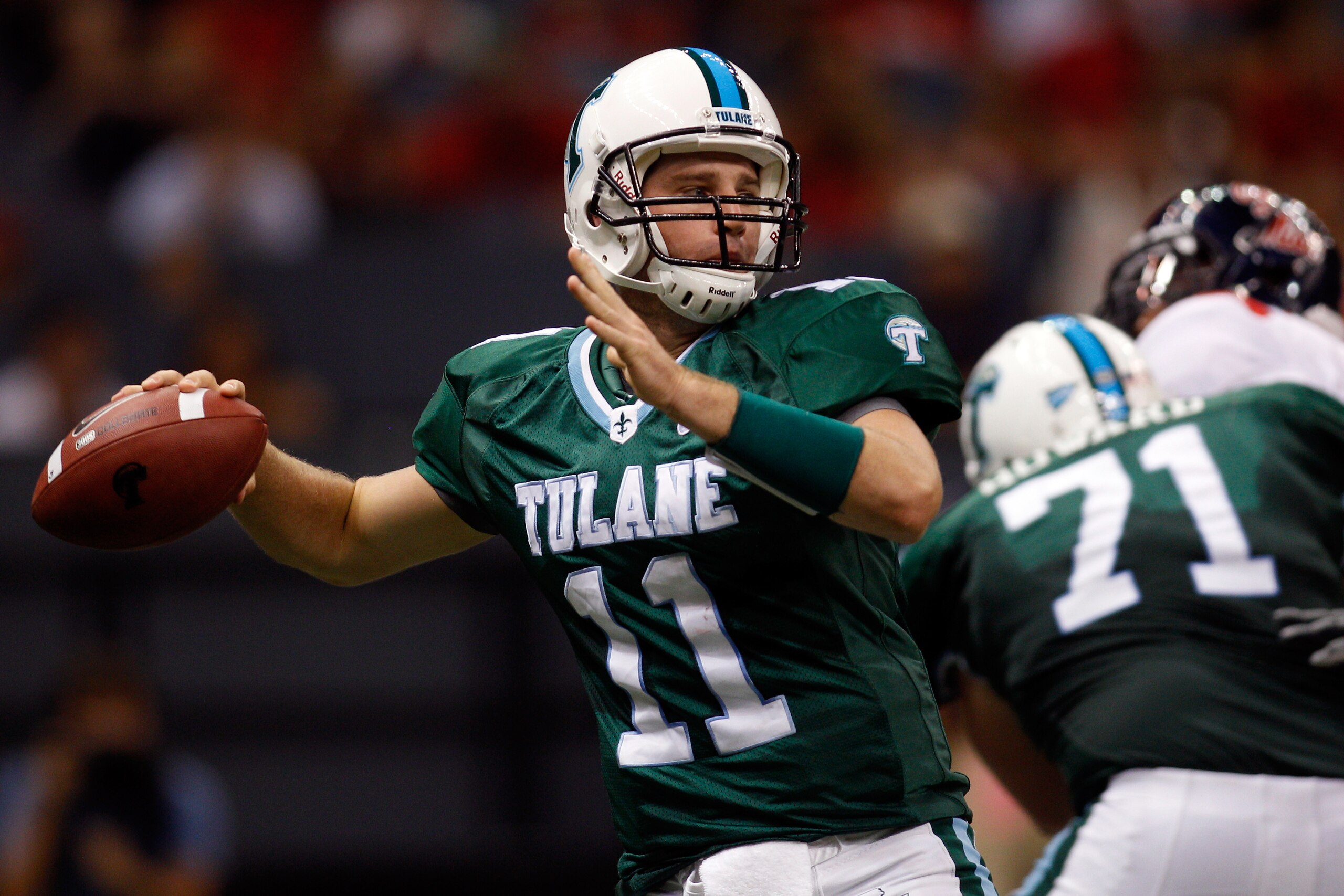 NEW ORLEANS - SEPTEMBER 11:  Ryan Griffin #11 of the Tulane Green Wave passes the ball against the Ole Miss Rebels at the Louisiana Superdome on September 11, 2010 in New Orleans, Louisiana.  (Photo by Chris Graythen/Getty Images)