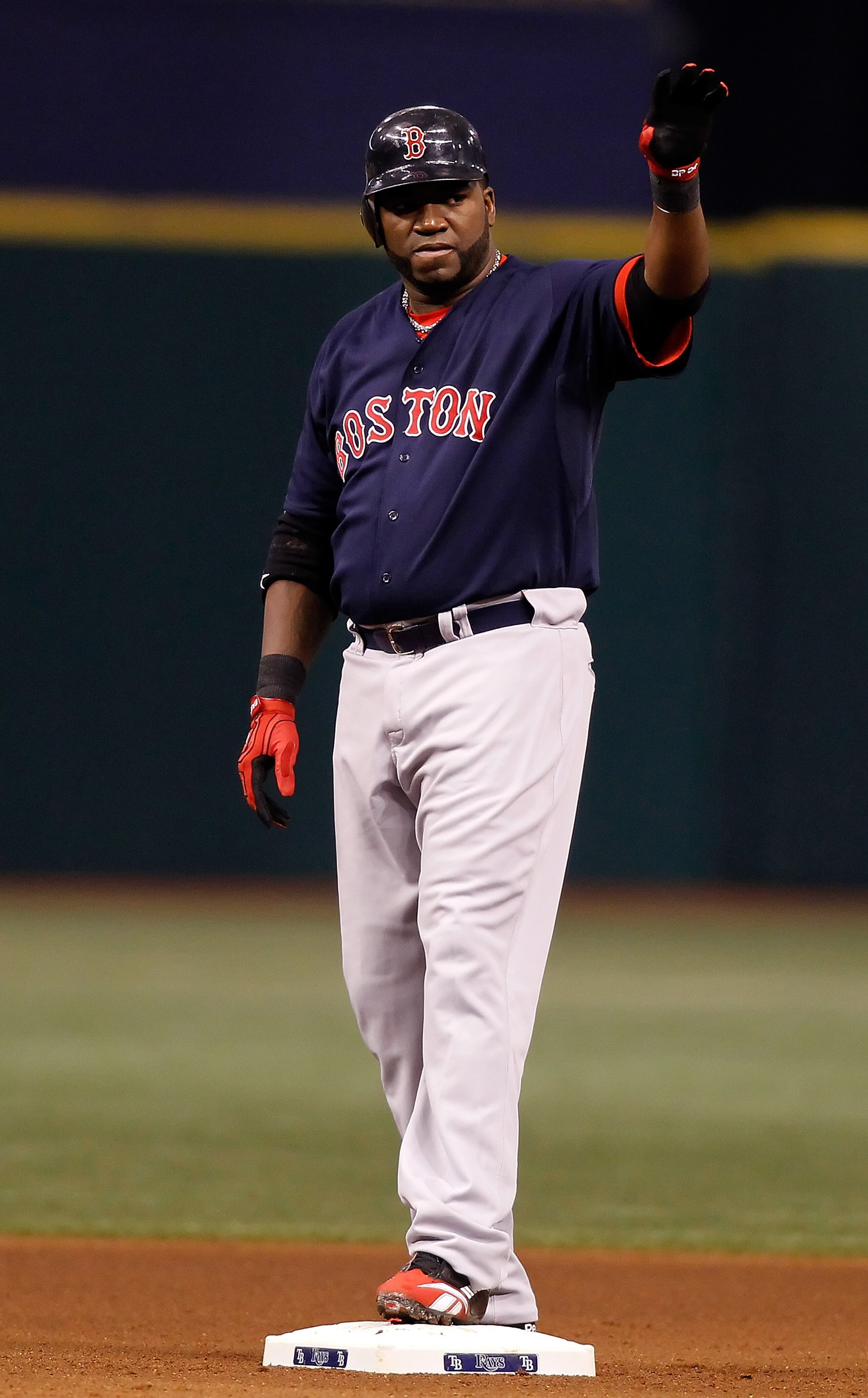 ST. PETERSBURG - AUGUST 27:  Designated hitter David Ortiz #34 of the Boston Red Sox waves to the crowd after hitting a double against the Tampa Bay Rays during the game at Tropicana Field on August 27, 2010 in St. Petersburg, Florida.  (Photo by J. Meric