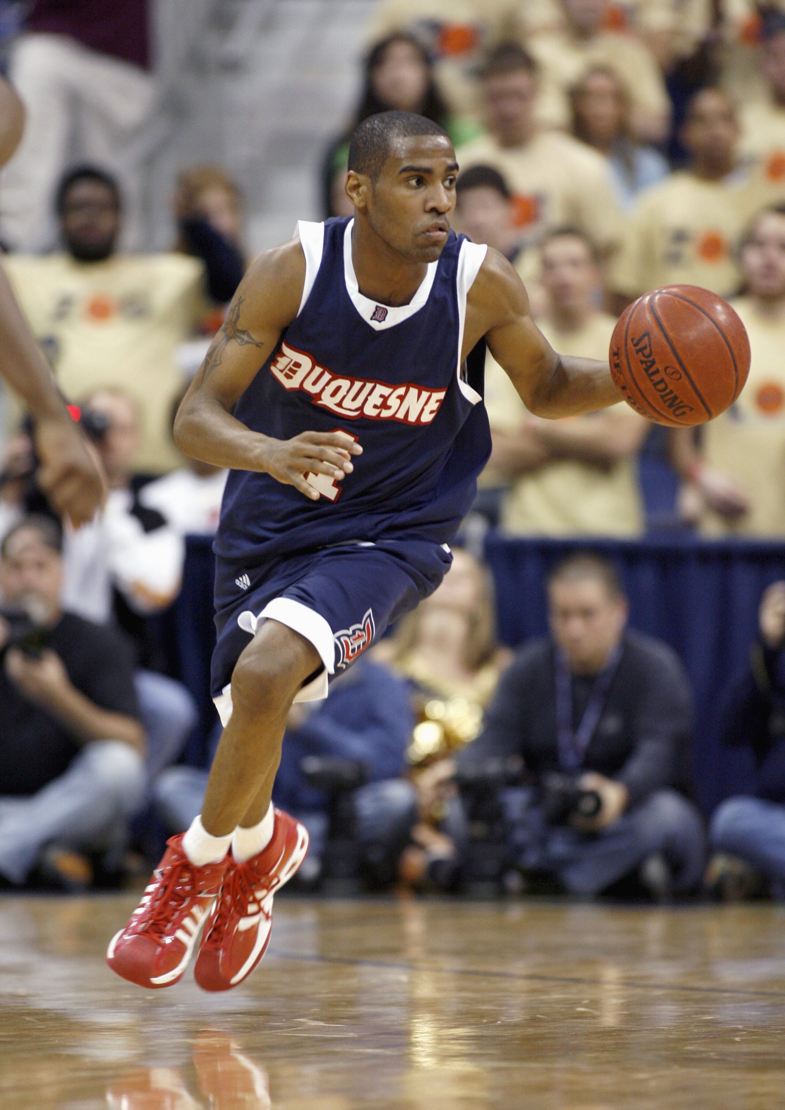 PITTSBURGH - DECEMBER 6: Aaron Jackson #1 of the Duquesne Dukes dribbles the ball during a game against the Pittsburgh Panthers on December 6, 2006 at the Petersen Events Center in Pittsburgh, Pennsylvania. Pittsburgh defeated Duquesne, 73-56. (Photo by G PITTSBURGH - DECEMBER 6: Aaron Jackson #1 of the Duquesne Dukes dribbles the ball during a game against the Pittsburgh Panthers on December 6, 2006 at the Petersen Events Center in Pittsburgh, Pennsylvania. Pittsburgh defeated Duquesne, 73-56. (Photo by G