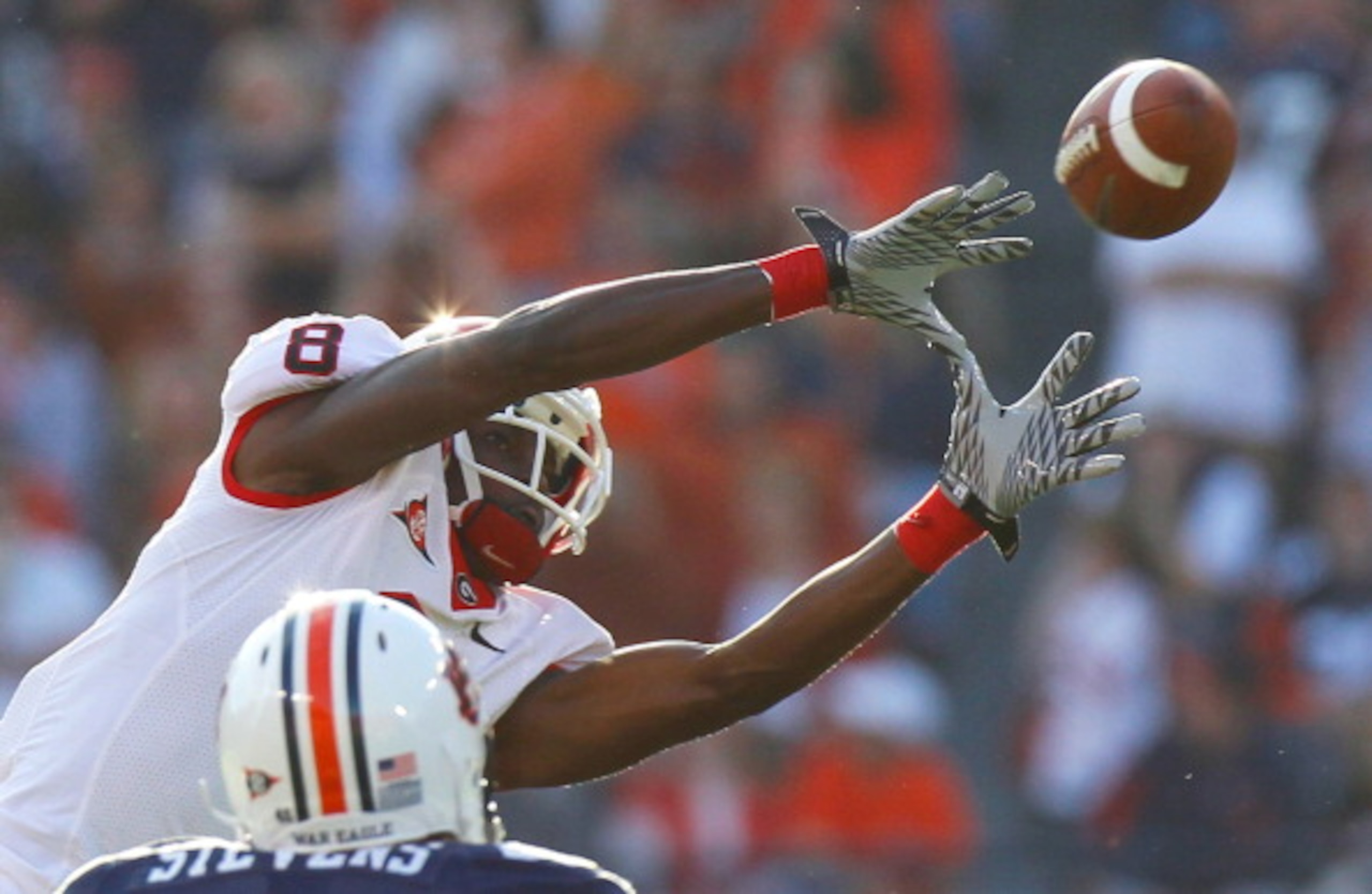 AUBURN, AL - NOVEMBER 13: A.J. Green #8 of the Georgia Bulldogs pulls in this reception against Craig Stevens #46 of the Auburn Tigers at Jordan-Hare Stadium on November 13, 2010 in Auburn, Alabama. (Photo by Kevin C. Cox/Getty Images) AUBURN, AL - NOVEMBER 13: A.J. Green #8 of the Georgia Bulldogs pulls in this reception against Craig Stevens #46 of the Auburn Tigers at Jordan-Hare Stadium on November 13, 2010 in Auburn, Alabama. (Photo by Kevin C. Cox/Getty Images)