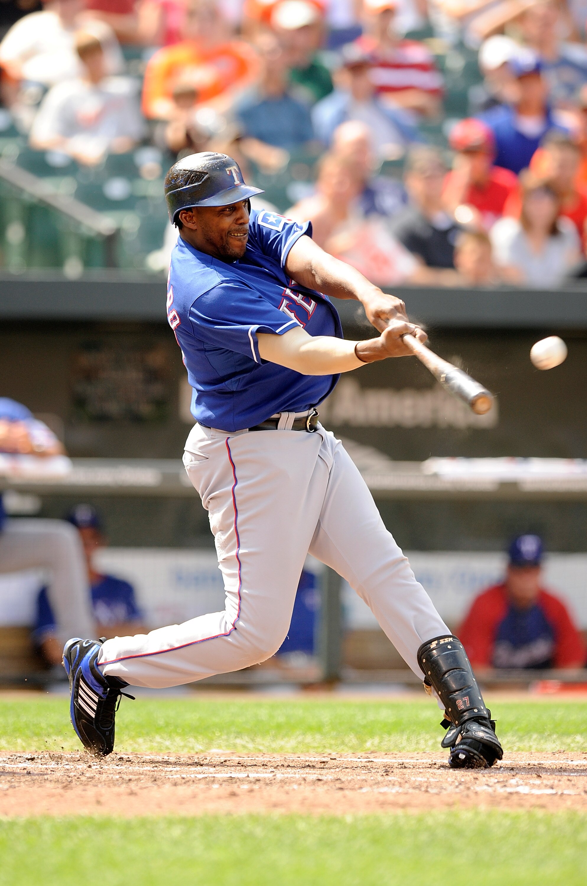 BALTIMORE - AUGUST 22:  Vladimir Guerrero #27 of the Texas Rangers hits a home run in the fifth inning against the Baltimore Orioles at Camden Yards on August 22, 2010 in Baltimore, Maryland.  (Photo by Greg Fiume/Getty Images)