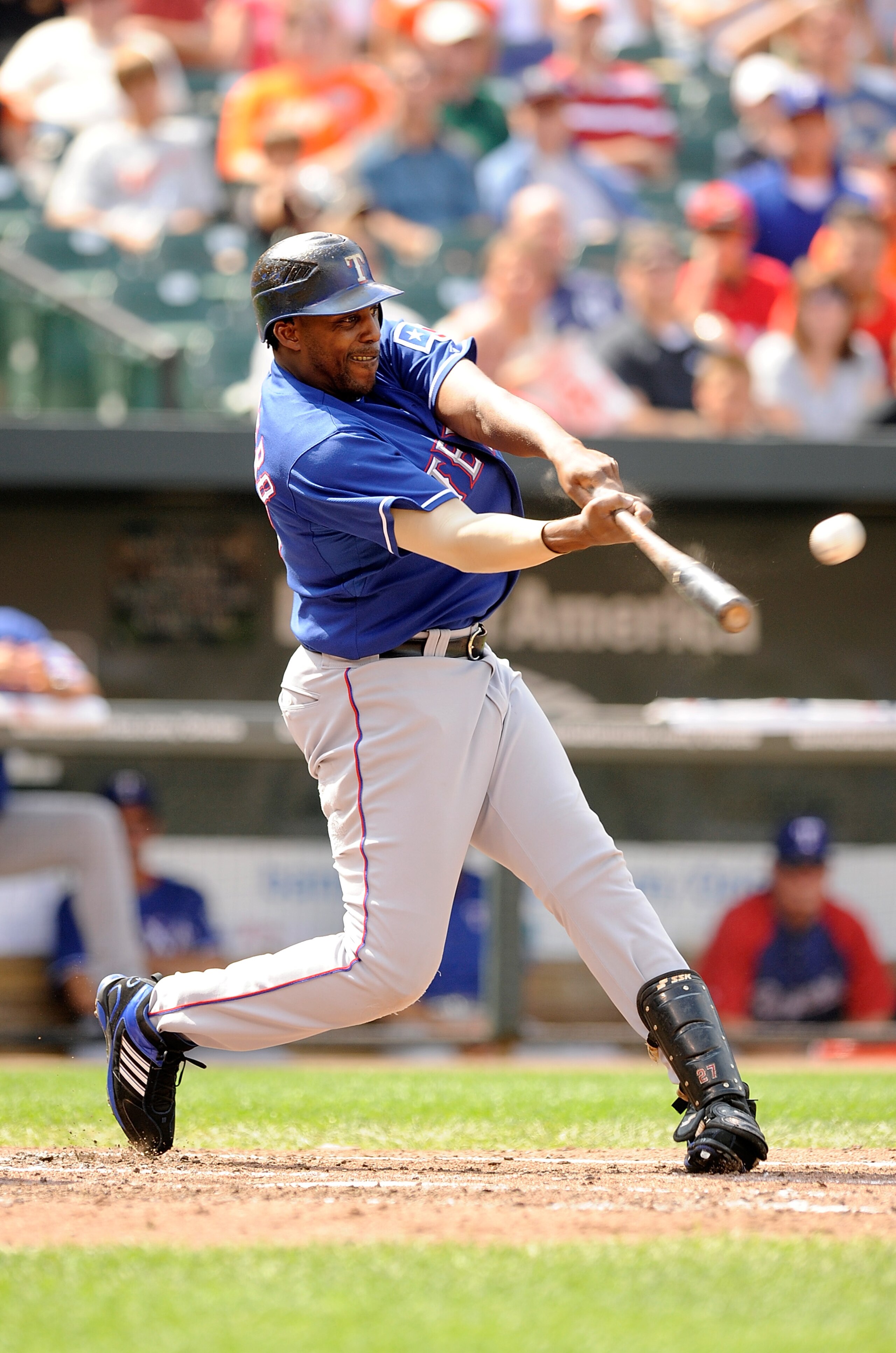 BALTIMORE - AUGUST 22:  Vladimir Guerrero #27 of the Texas Rangers hits a home run in the fifth inning against the Baltimore Orioles at Camden Yards on August 22, 2010 in Baltimore, Maryland.  (Photo by Greg Fiume/Getty Images)