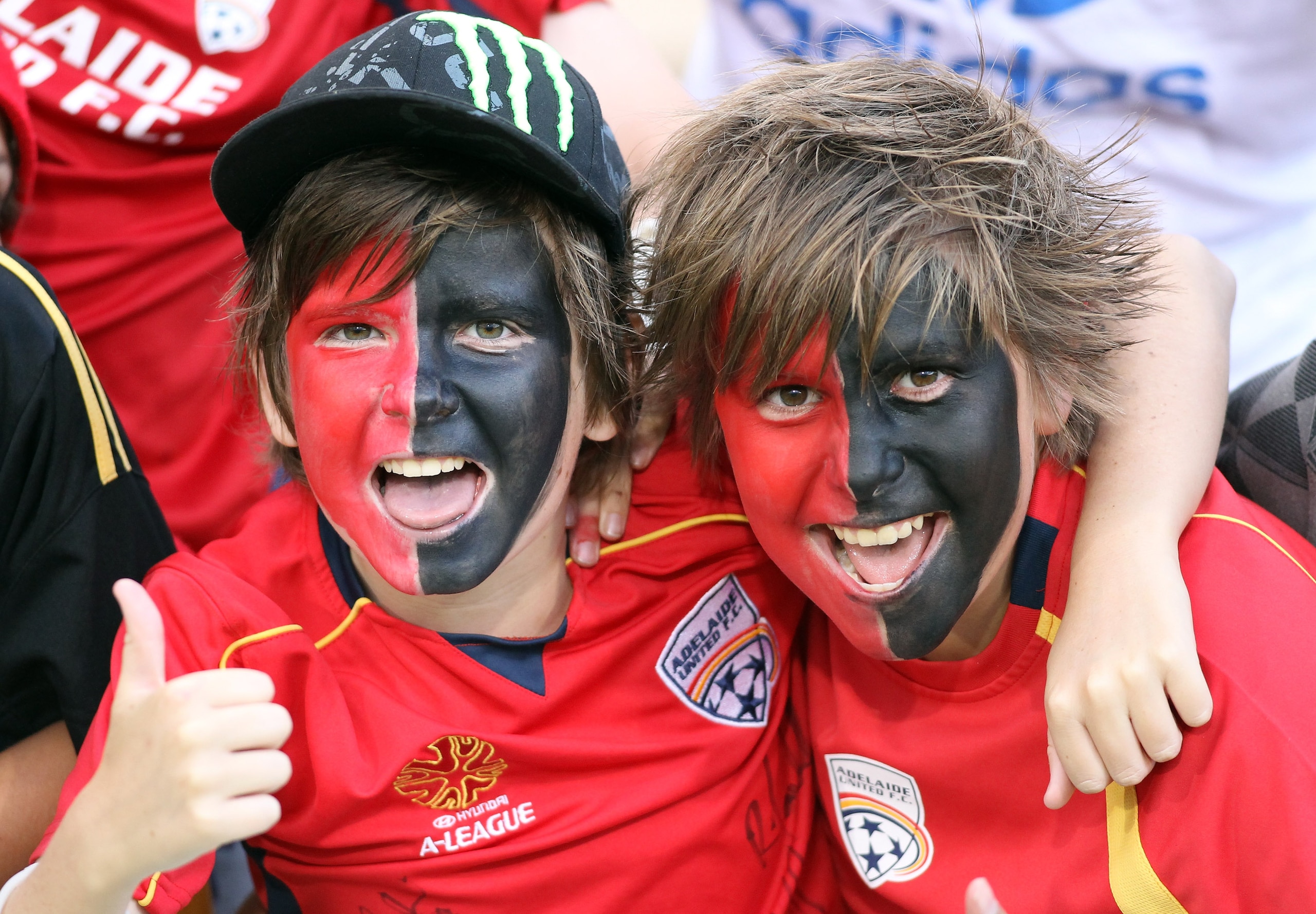 ADELAIDE, AUSTRALIA - FEBRUARY 11: Fans cheers for Adelaide during the round 27 A-League match between Adelaide United and the Melbourne Victory at Adelaide Oval on February 11, 2011 in Adelaide, Australia. (Photo by Morne de Klerk/Getty Images) ADELAIDE, AUSTRALIA - FEBRUARY 11: Fans cheers for Adelaide during the round 27 A-League match between Adelaide United and the Melbourne Victory at Adelaide Oval on February 11, 2011 in Adelaide, Australia. (Photo by Morne de Klerk/Getty Images)