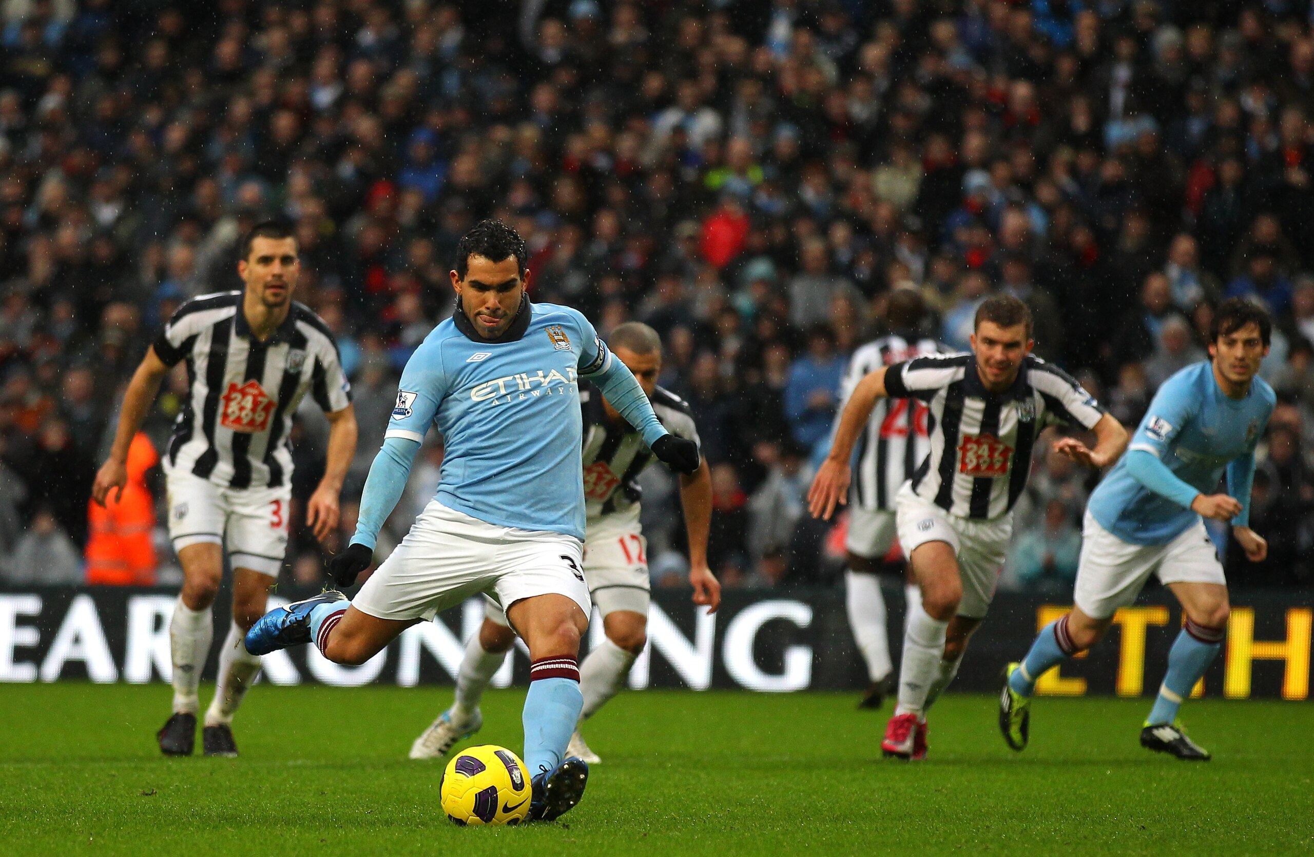MANCHESTER, ENGLAND - FEBRUARY 05:  Carlos Tevez of Manchester City scores his second goal from the penalty spot during the Barclays Premier League match between Manchester City and West Bromwich Albion at the City of Manchester Stadium on February 5, 201