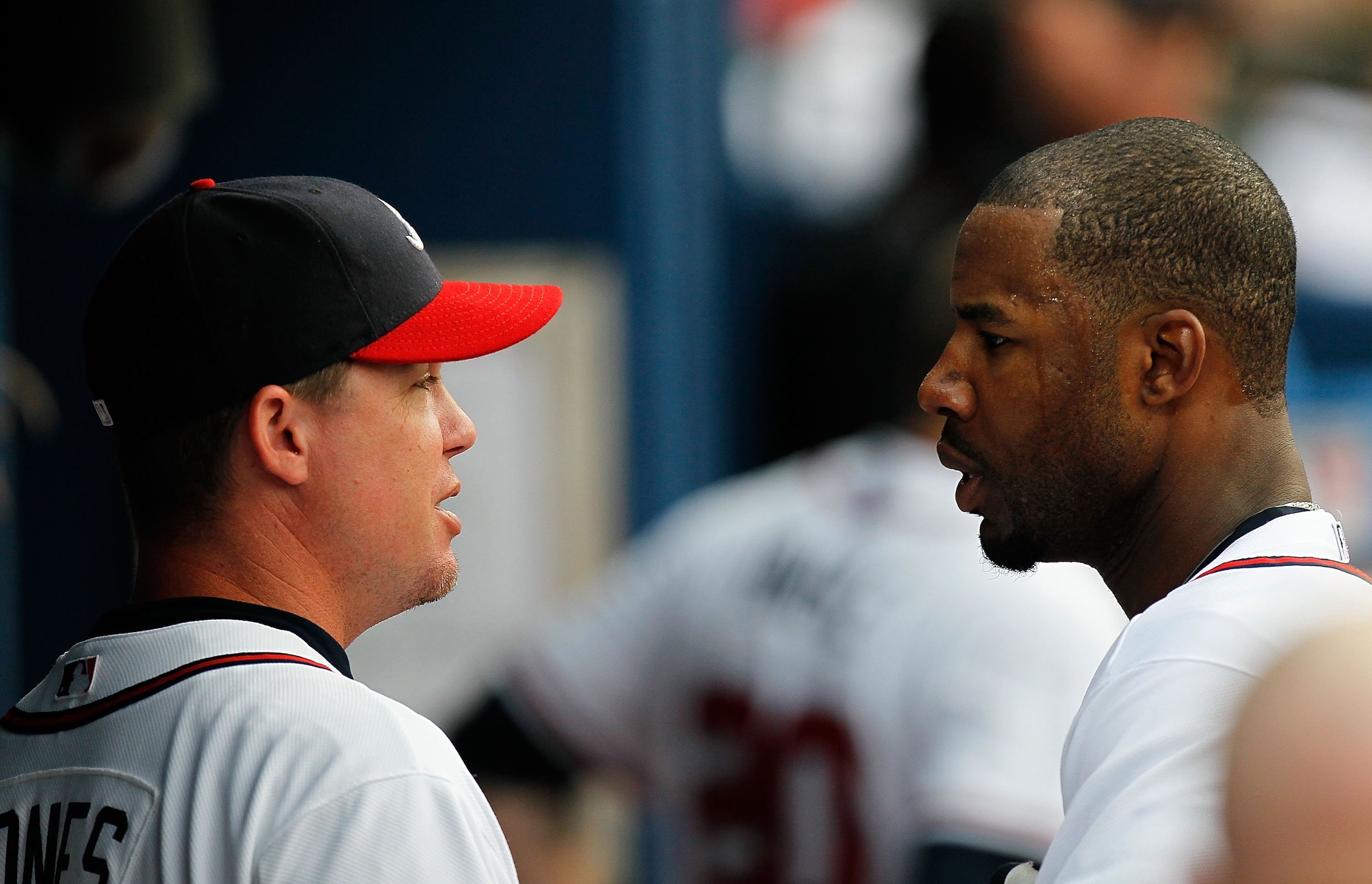 ATLANTA - JUNE 17:  Jason Heyward #22 and Chipper Jones #10 of the Atlanta Braves against the Tampa Bay Rays at Turner Field on June 17, 2010 in Atlanta, Georgia.  (Photo by Kevin C. Cox/Getty Images)