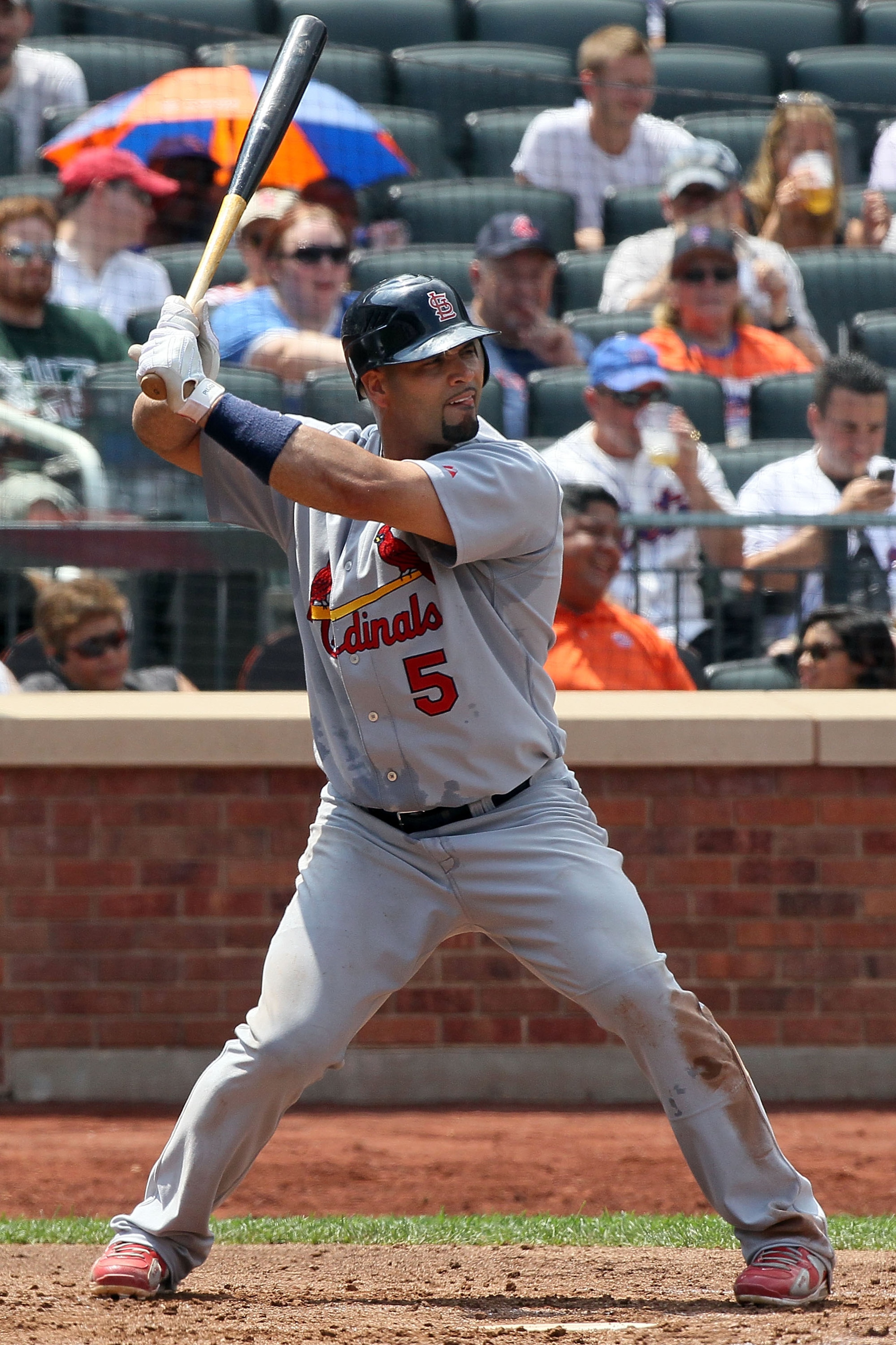 NEW YORK - JULY 29:  Albert Pujols #5 of the St. Louis Cardinals bats against the New York Mets on July 29, 2010 at Citi Field in the Flushing neighborhood of the Queens borough of New York City. The Mets defeated the Cardinals 4-0.  (Photo by Jim McIsaac